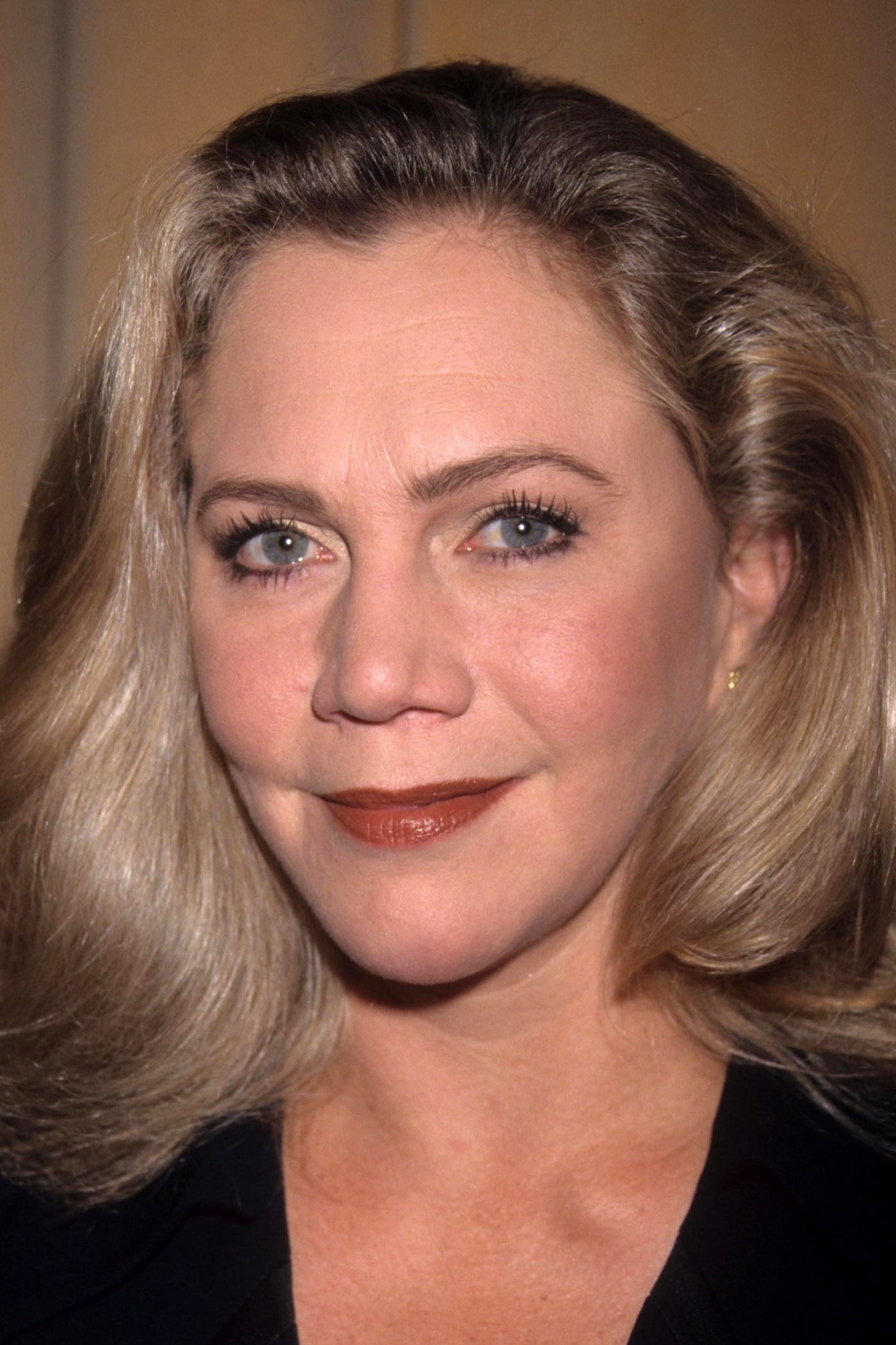 Kathleen Turner: Took lead role of Jane Blue in a 1993 action comedy film, Undercover Blues. 1400x2100 HD Background.