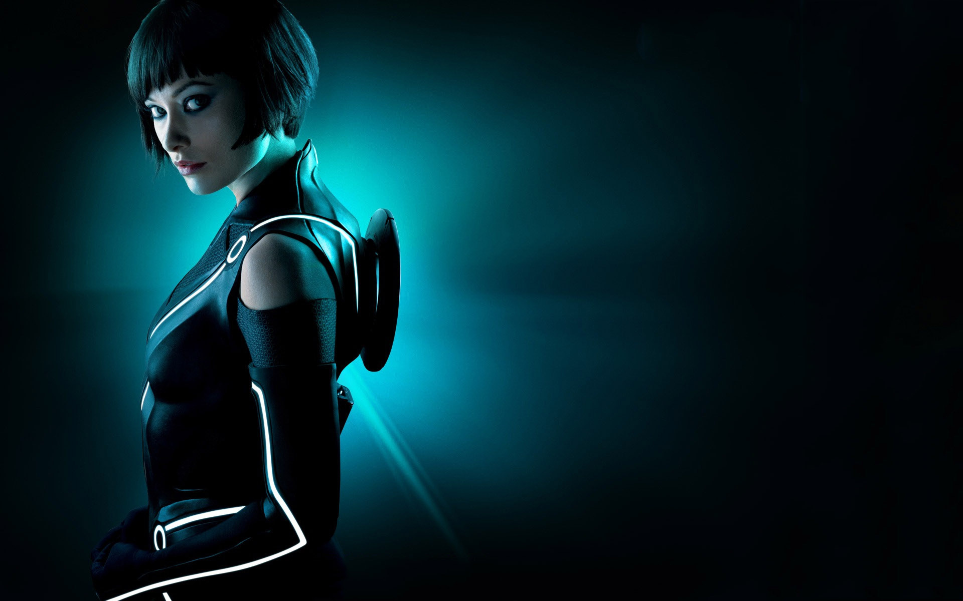 Tron (Movie): Olivia Wilde played Quorra, a program who helps Sam and Kevin in their quest. 1920x1200 HD Background.