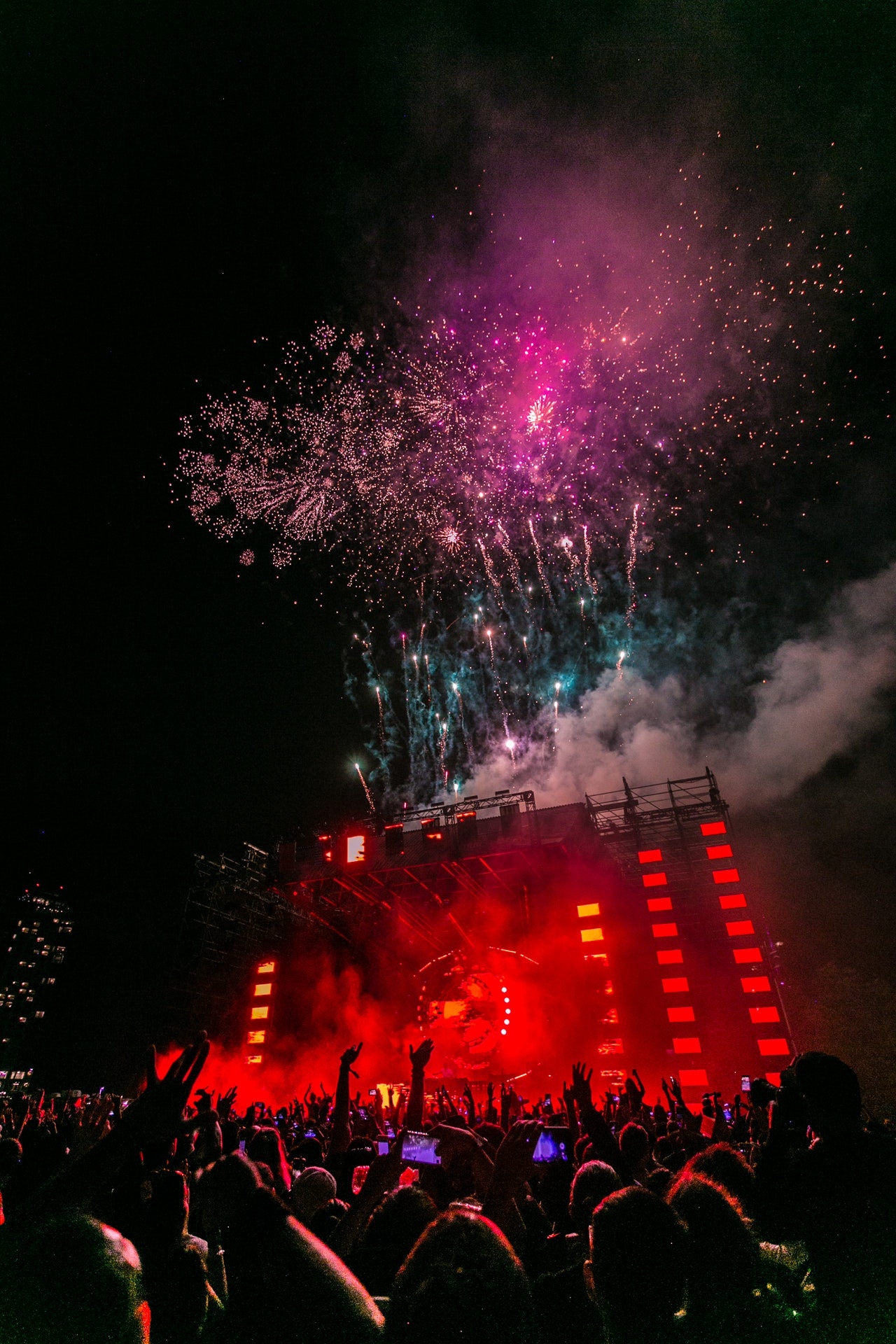 Concert: Big music festival, Special effects, Fireworks lit up the crowd. 1280x1920 HD Background.