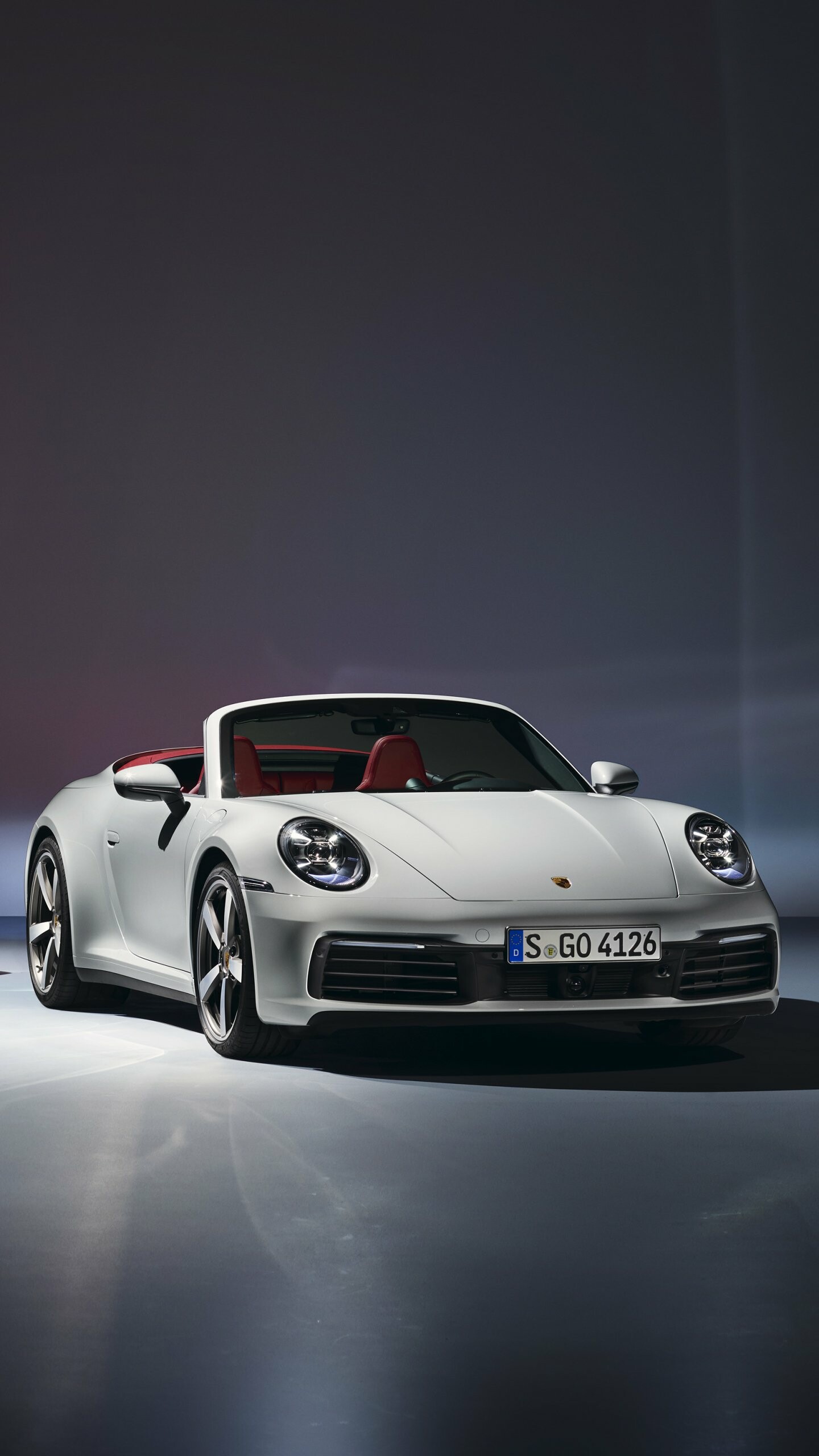 Porsche: The base-spec 911, powered by a 385bhp 3.0-liter twin-turbo flat-six, Carrera, Cabriolet. 1440x2560 HD Background.