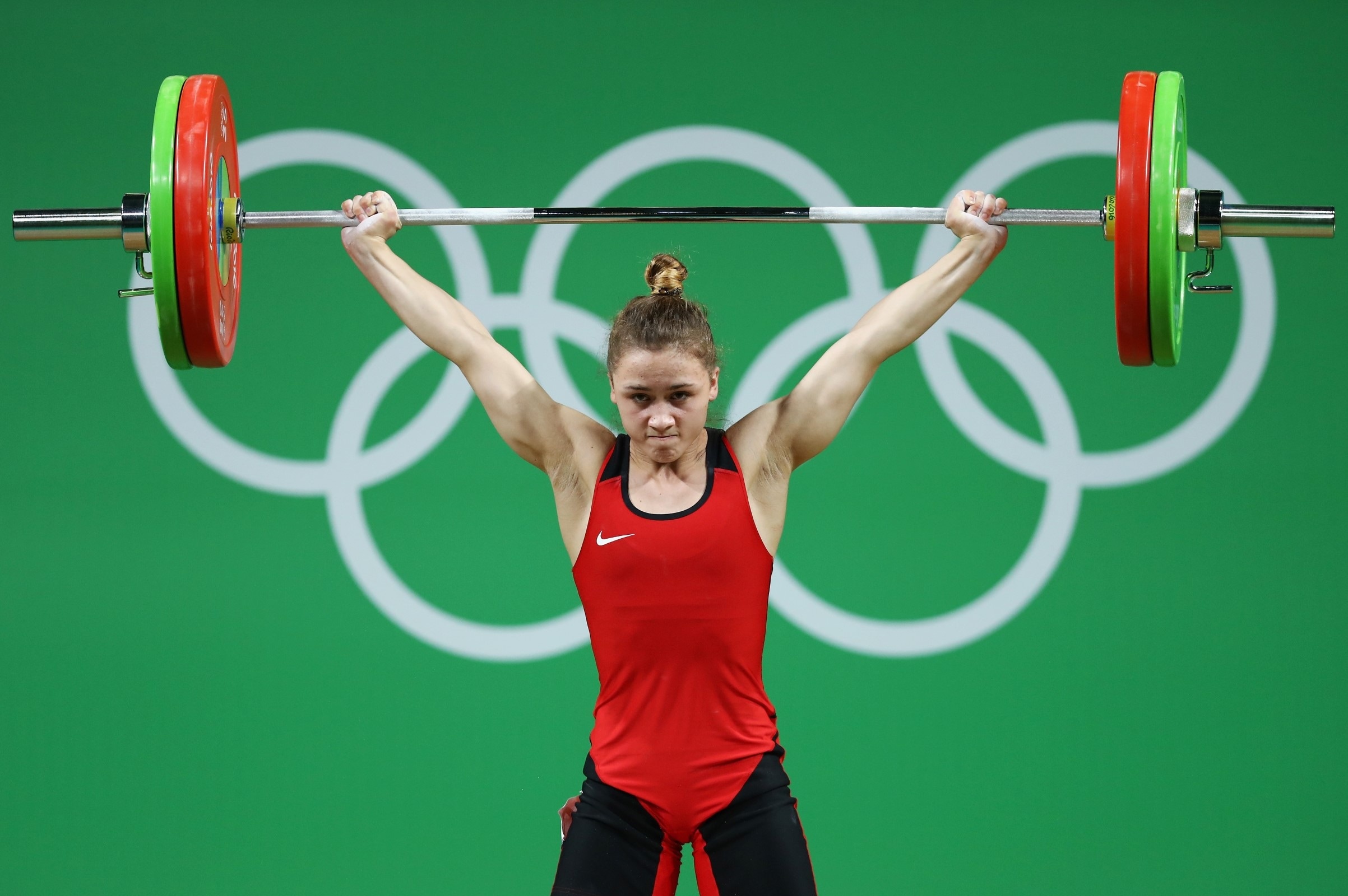 Weightlifting: 53 kg women's division, The barbell in the hands, Core strength. 2410x1600 HD Wallpaper.