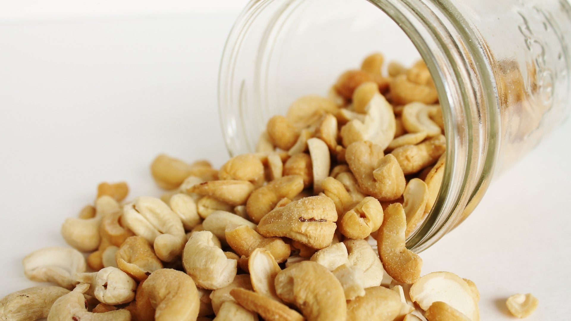 Cashew Nuts: Sold both raw or roasted, and salted or unsalted, A good source of protein. 1920x1080 Full HD Background.