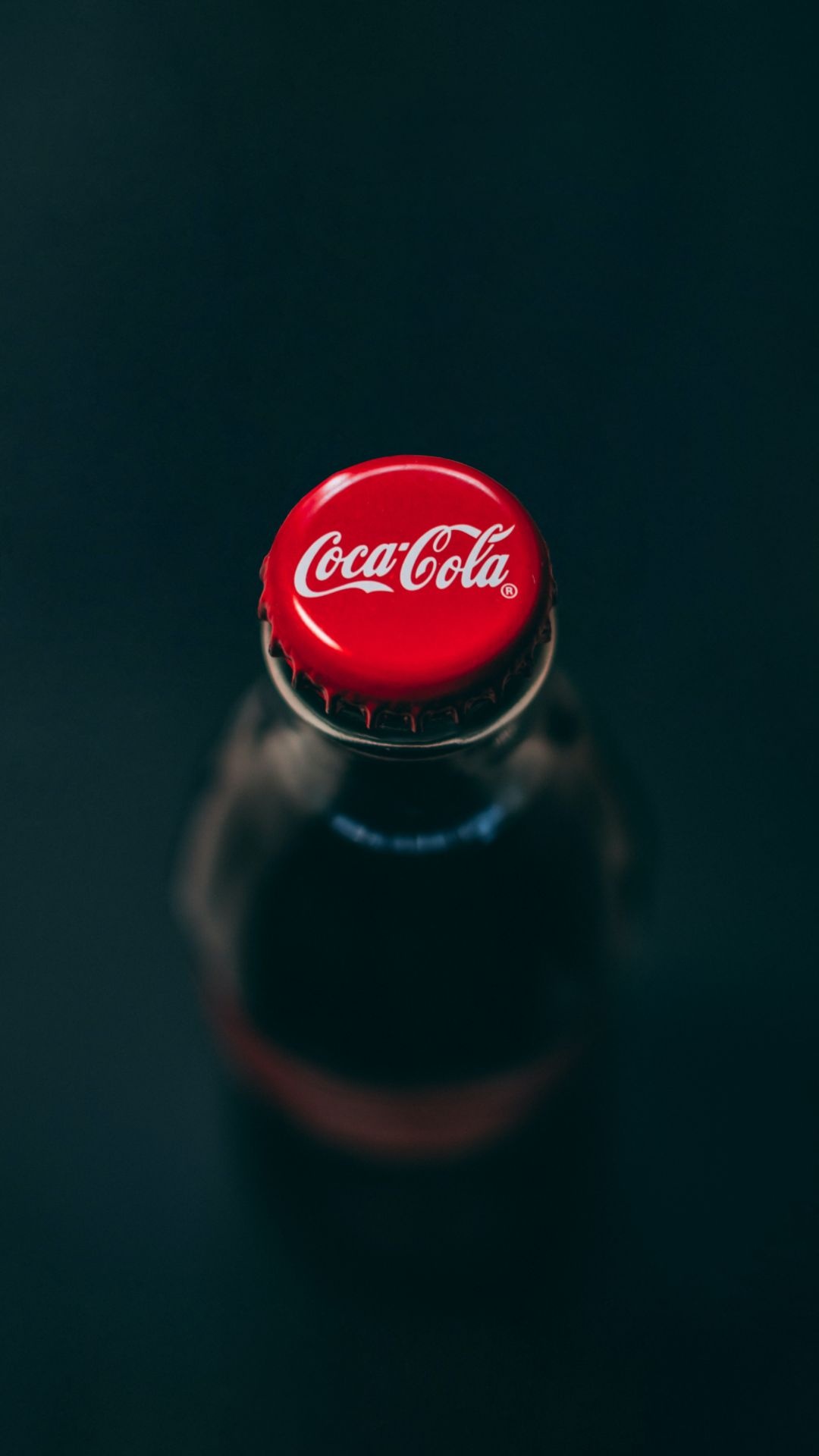 Coca-Cola: The dark brown carbonated soft drink, Universally recognizable logo. 1080x1920 Full HD Background.