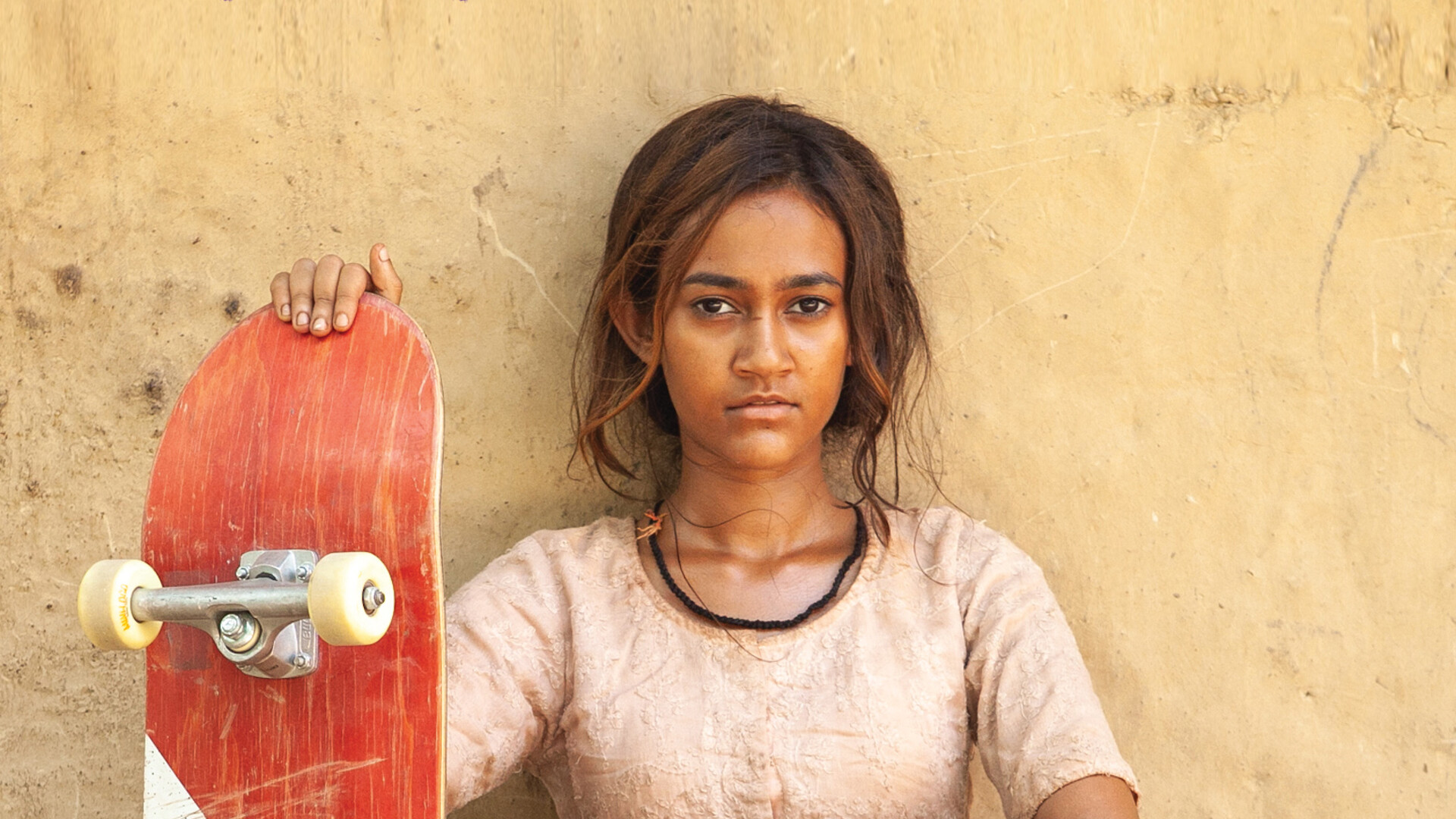 Girl Skateboarding: Rachel Saanchita Gupta, An Indian actor, The role of Prerna in the Indian-American Netflix film 'Skater Girl', 2021. 1920x1080 Full HD Background.