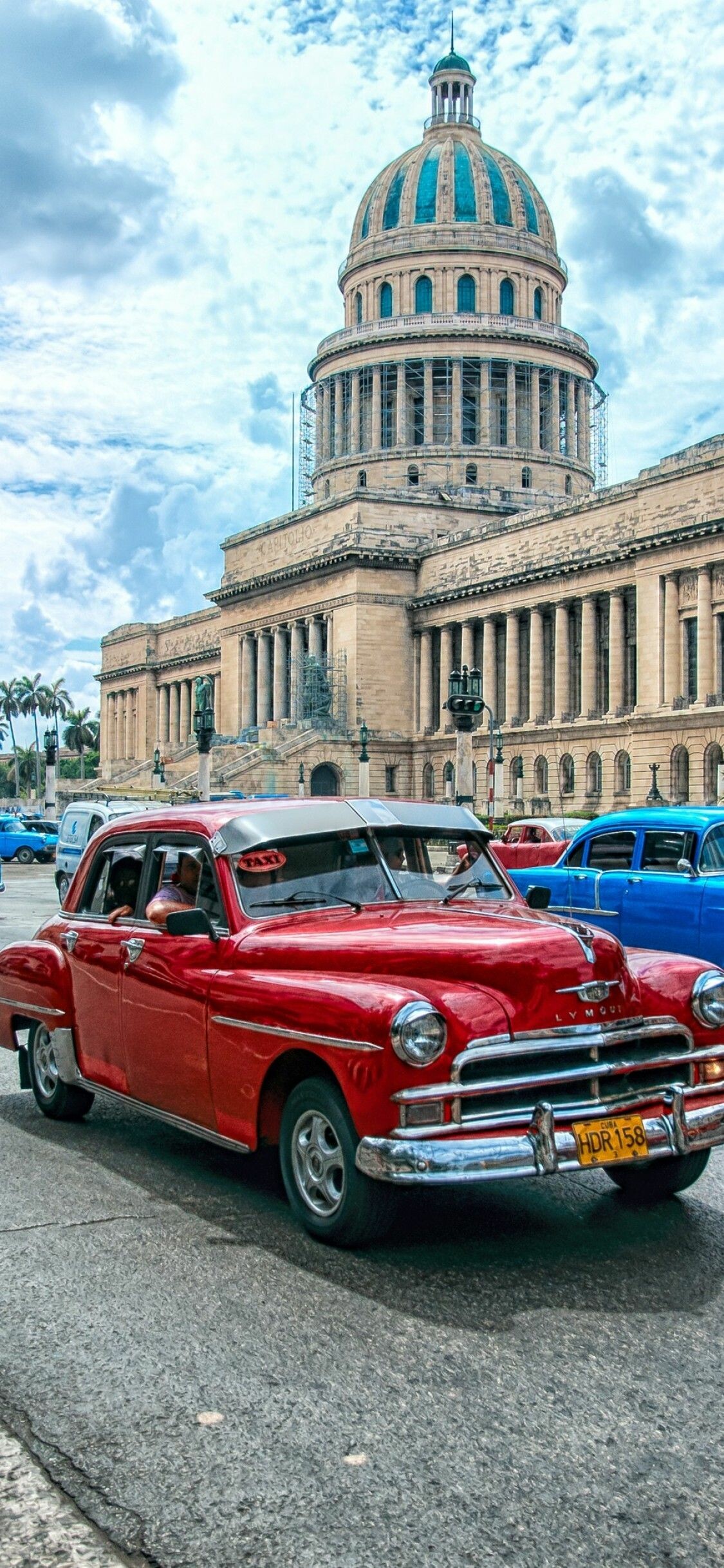 Cuba: Havana, the country's colorful capital, is known for the Spanish colonial architecture. 1130x2440 HD Background.