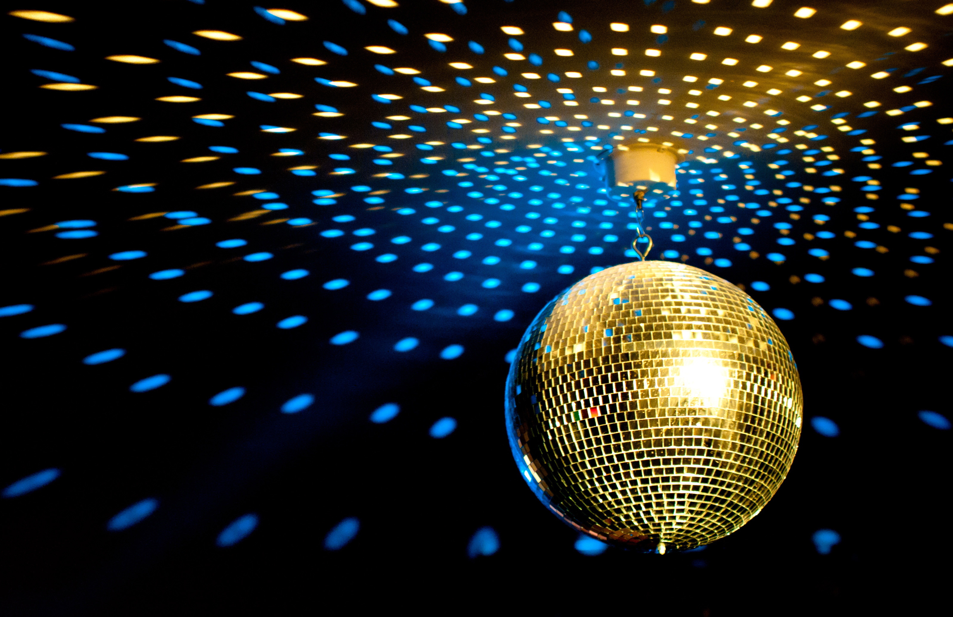 Disco: A ball covered with mirrored facets, Suspended from a ceiling, Rotates to cast reflected light. 3200x2070 HD Wallpaper.