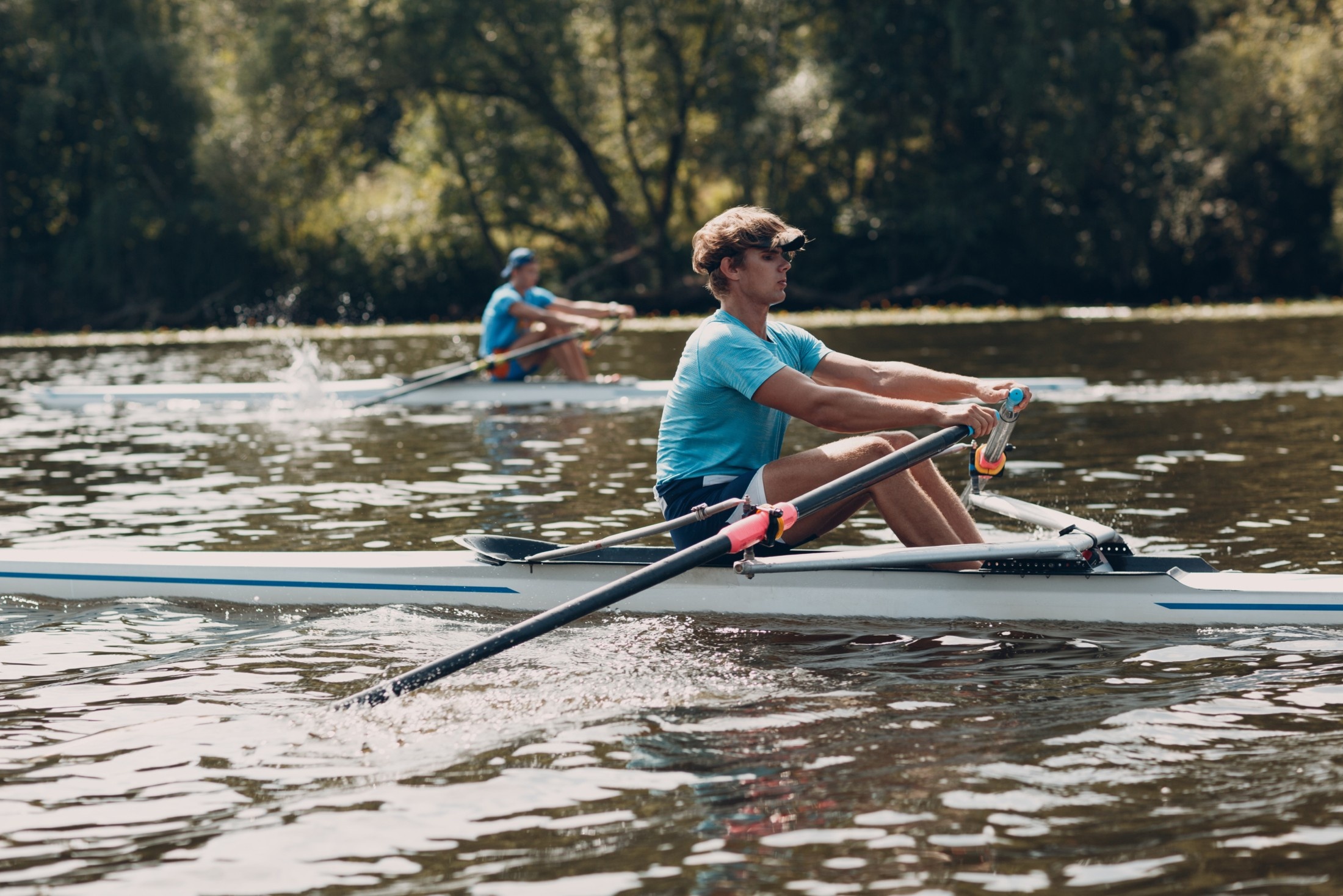 Rowing: A couple of scullers during a trip on a wide river, Recreational and competitive water sport. 2200x1470 HD Wallpaper.