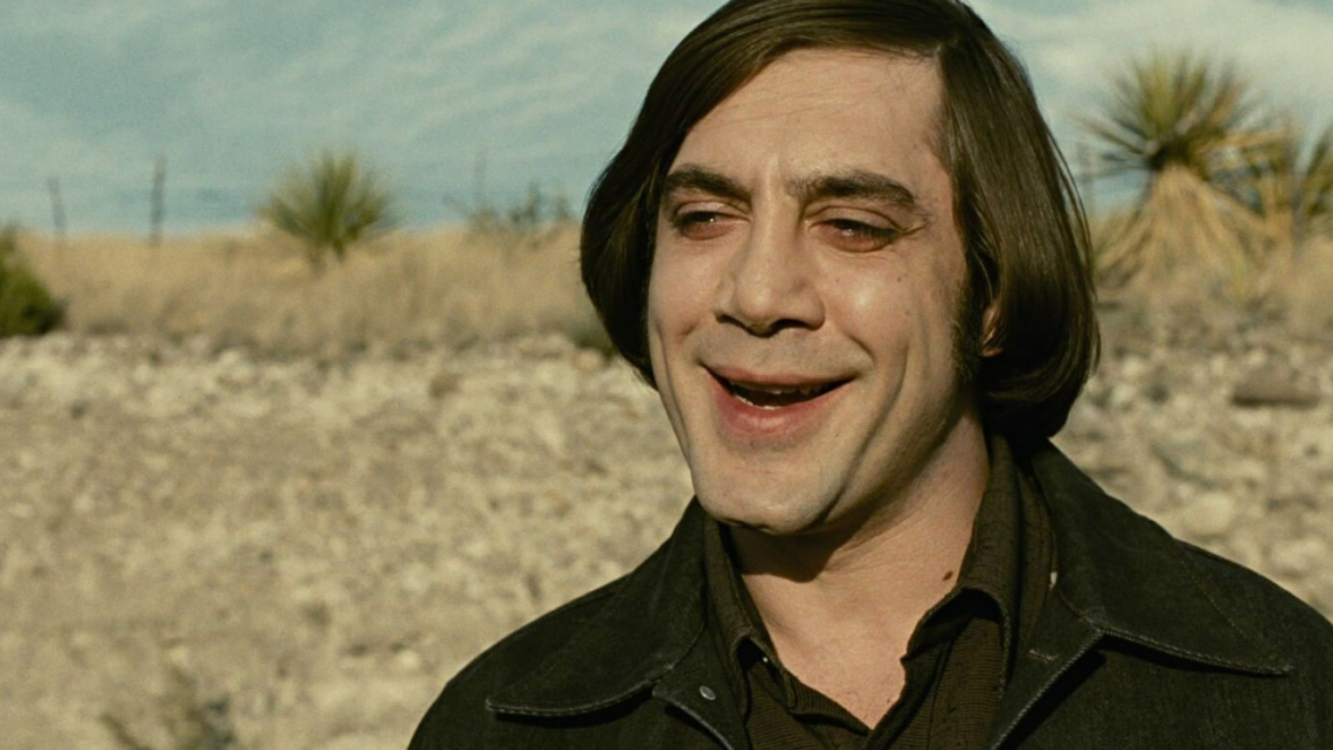 No Country For Old Men (Movie): Anton Chigurh's crazy smile, Javier Bardem, 2007 movie, AFI Movie of the Year. 1920x1080 Full HD Wallpaper.