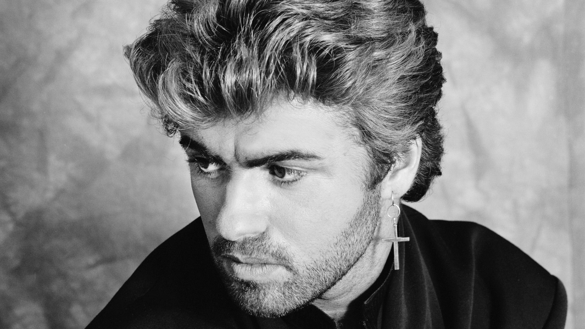 George Michael: Began his solo career with his first single, ‘Careless Whisper,’ in 1984. 1920x1080 Full HD Background.