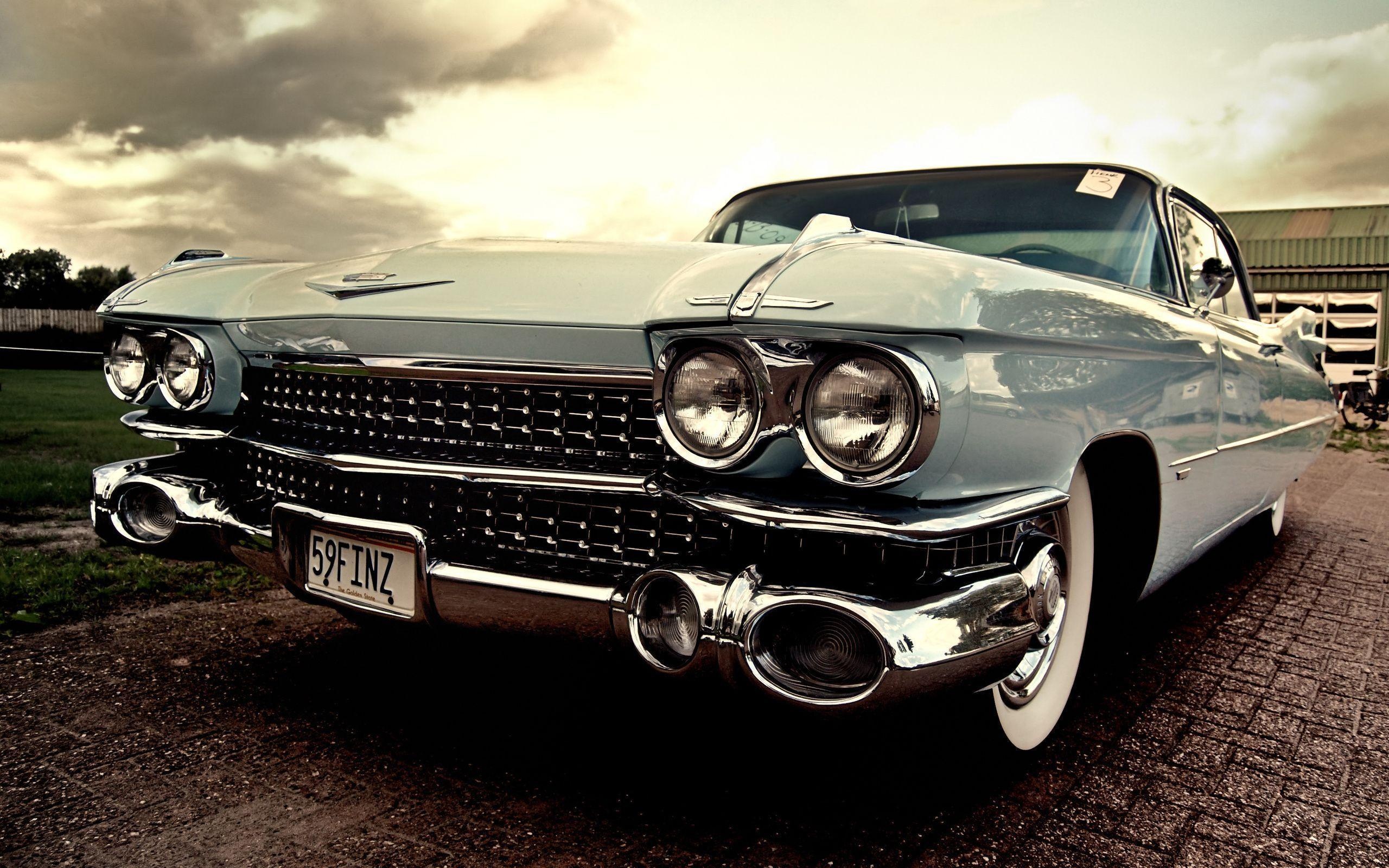 Vintage Car: A symbol of status and luxury during their time, Cadillac de Ville series. 2560x1600 HD Background.
