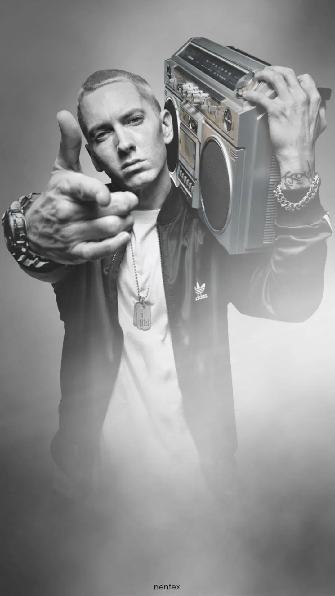 Eminem: Became passionate about rapping at a young age of fourteen. 1080x1920 Full HD Background.