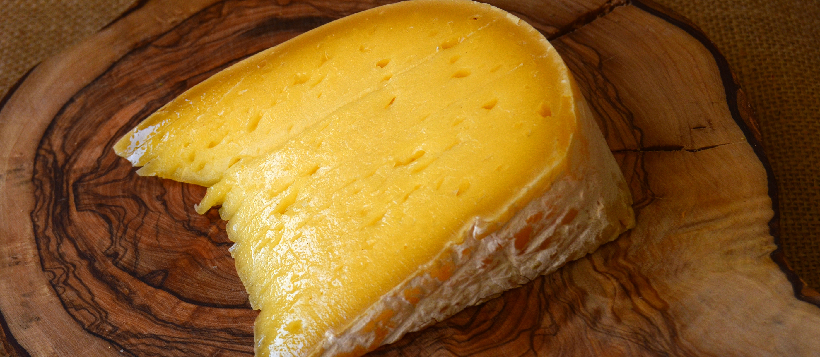 Cheese: The flavor ranges from mild and creamy to sharp and tangy. 2800x1220 Dual Screen Background.