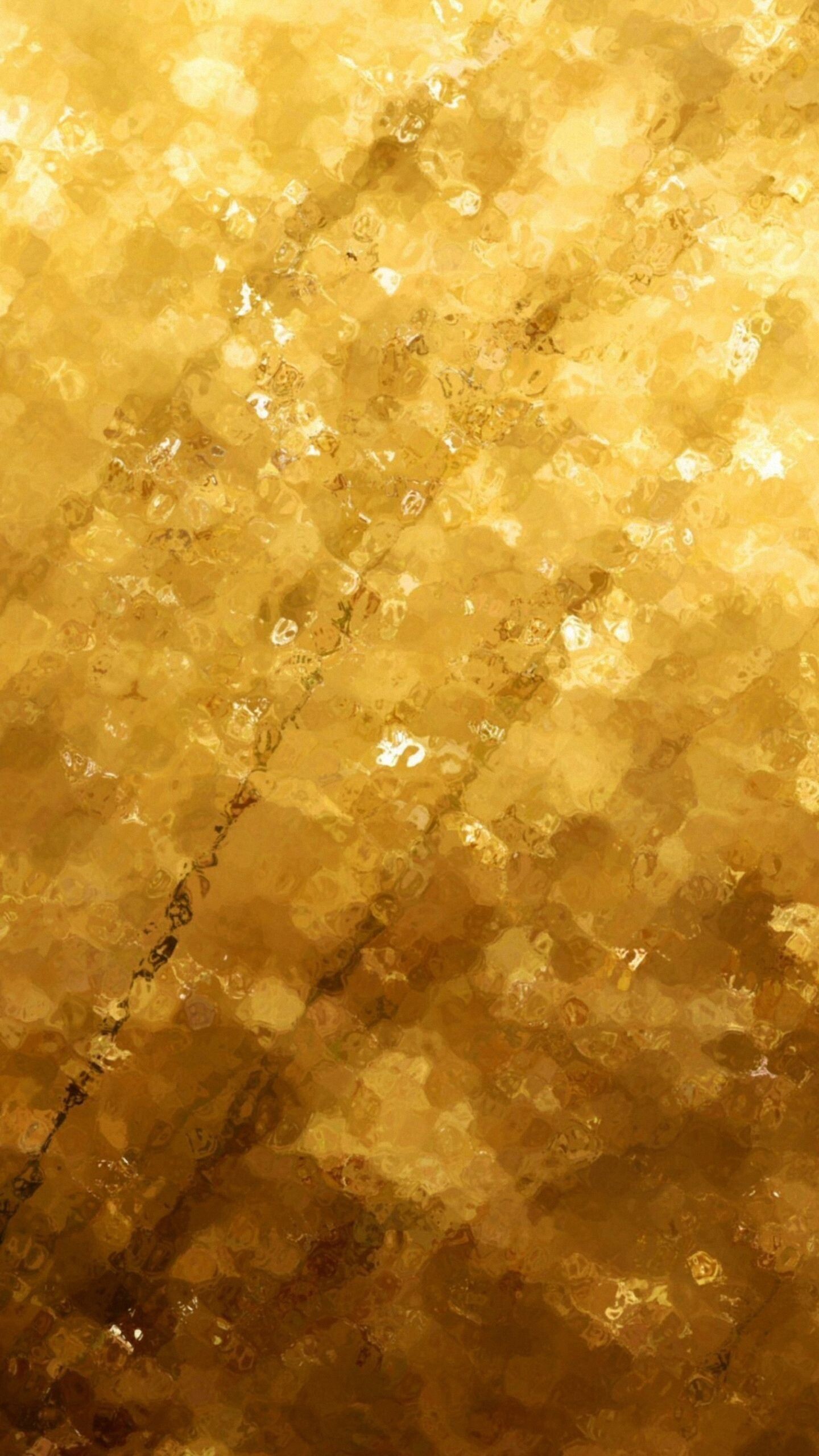 Gold Sparkle: Out-of-focus blurred lights, Light-reflecting golden decorative material, Tints and shades. 1440x2560 HD Background.