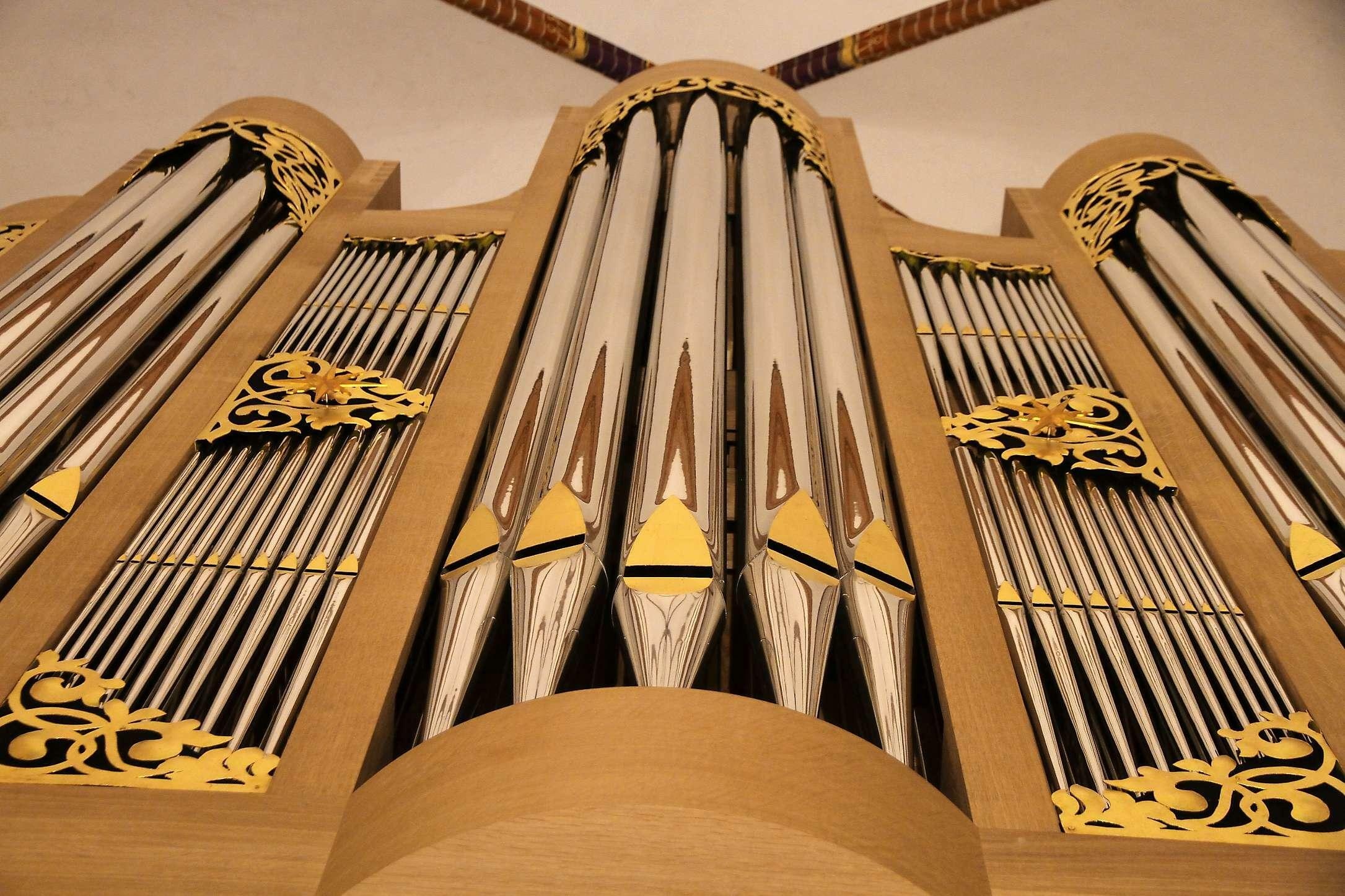 Pipe Organ: A musical instrument that produces sound by driving pressurized air through the tubes. 2180x1450 HD Background.