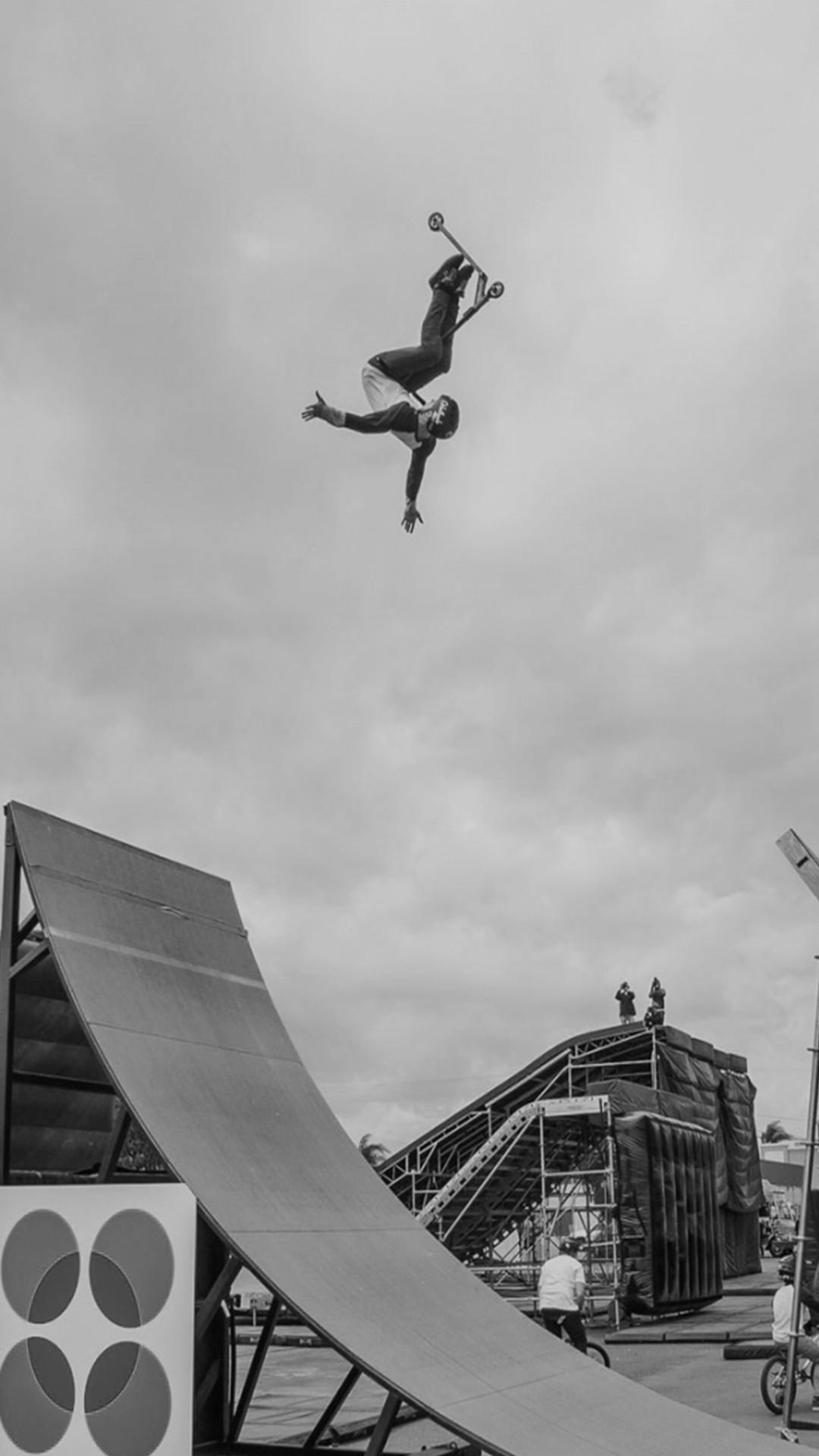 Scootering: Monochrome, Black and White, Freestyle scooter riding, Extreme acrobatics in the air, Extreme sports stunts. 1080x1920 Full HD Wallpaper.