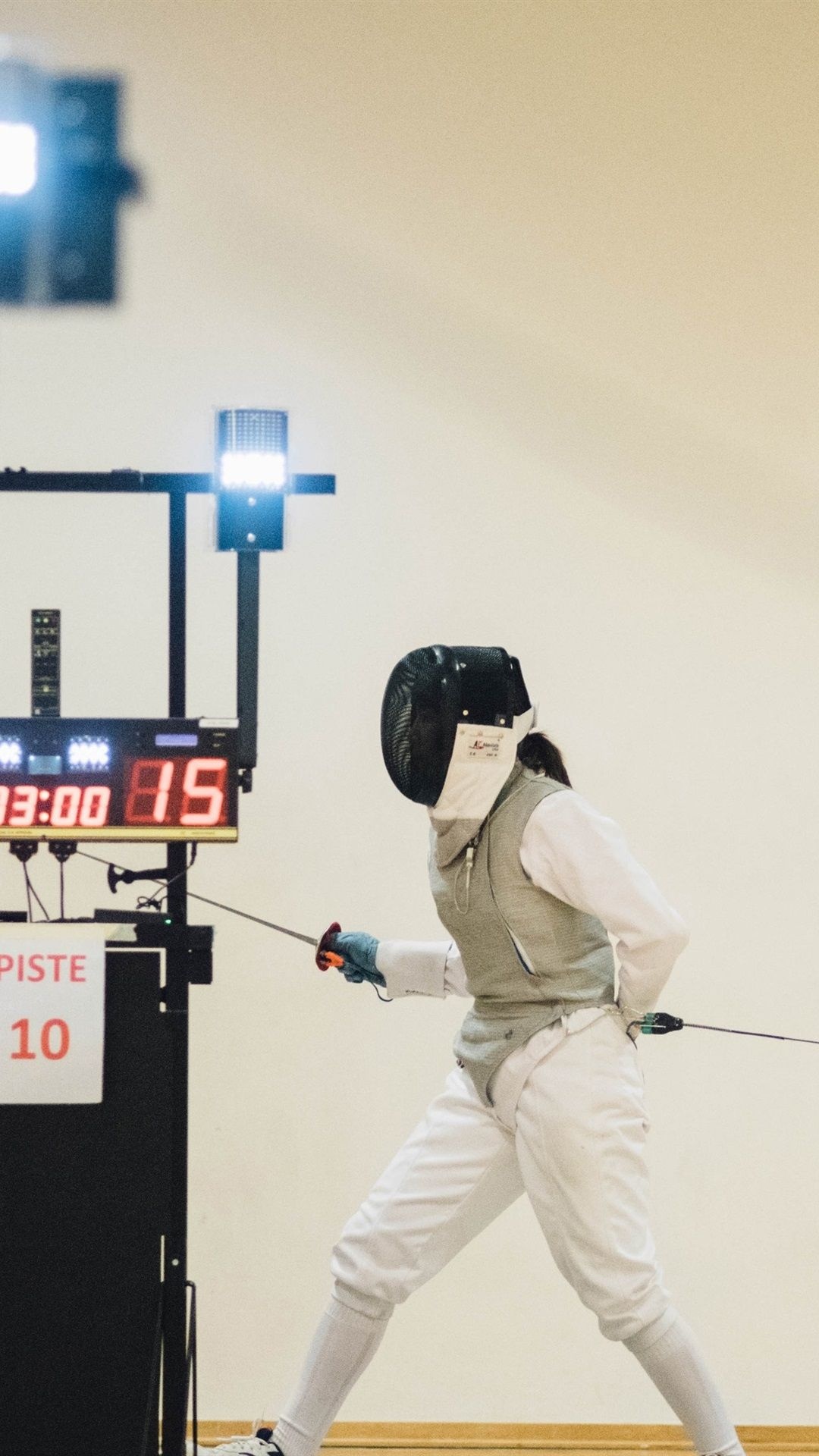 Fencing: Foil fencer practices defensive techniques before the actual duel, Combat sports. 1080x1920 Full HD Wallpaper.