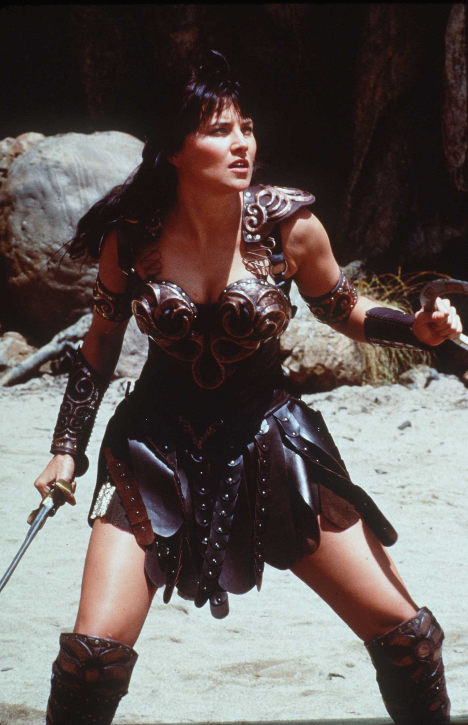 Xena: Warrior Princess (TV Series): A character with remarkable skill and prowess in hand-to-hand combat. 1520x2350 HD Wallpaper.