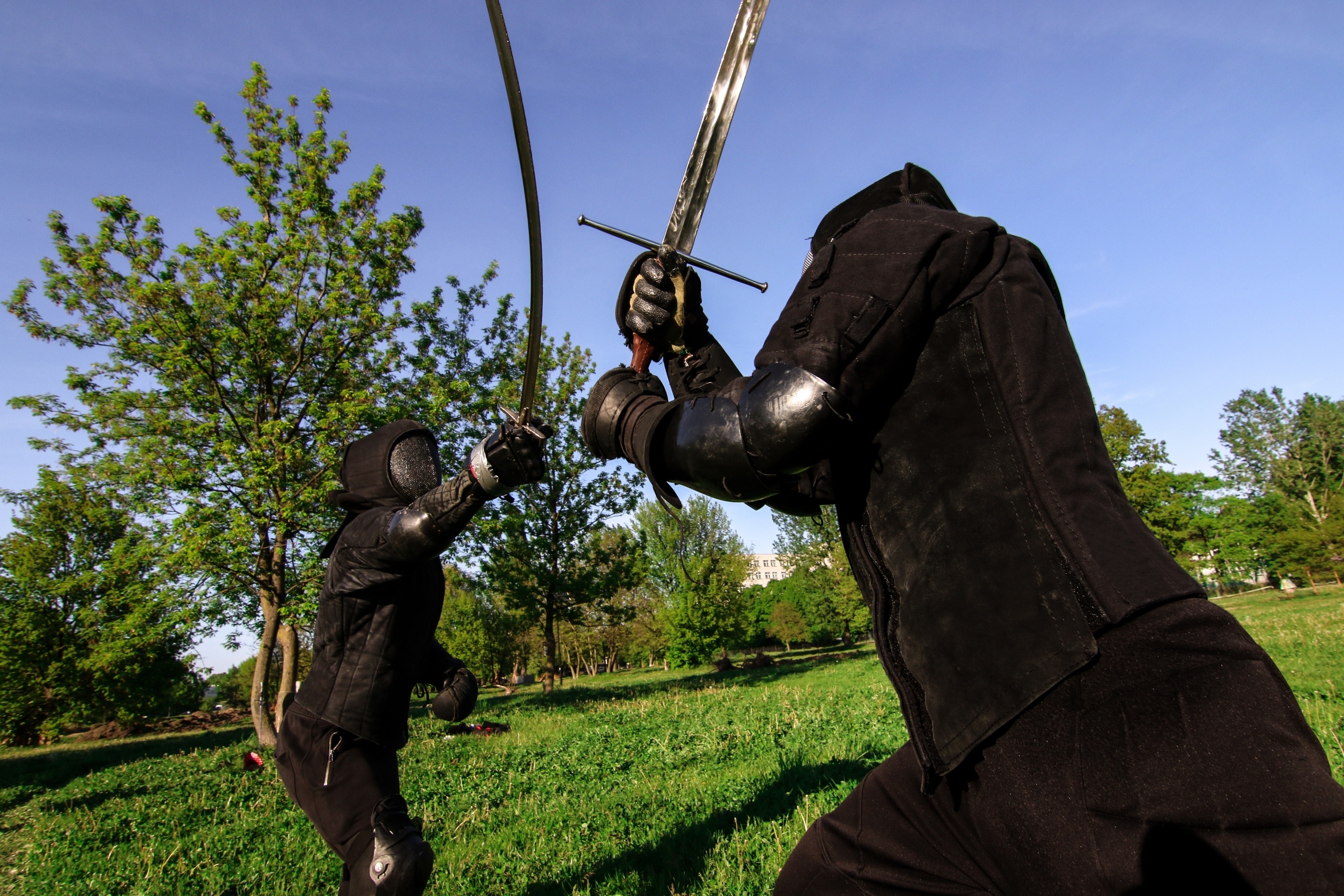 Sword Fighting: The use of longswords reconstruction participants, Historical European martial arts, HEMA Fencing. 2560x1710 HD Background.