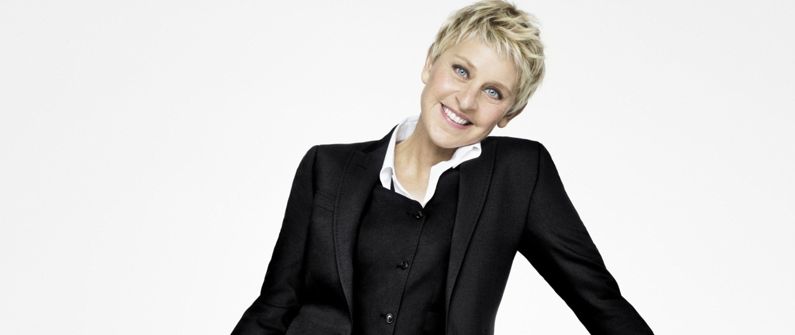 Ellen DeGeneres: A stand-up comedian, An advocate for LGBTQ rights. 2560x1080 Dual Screen Background.