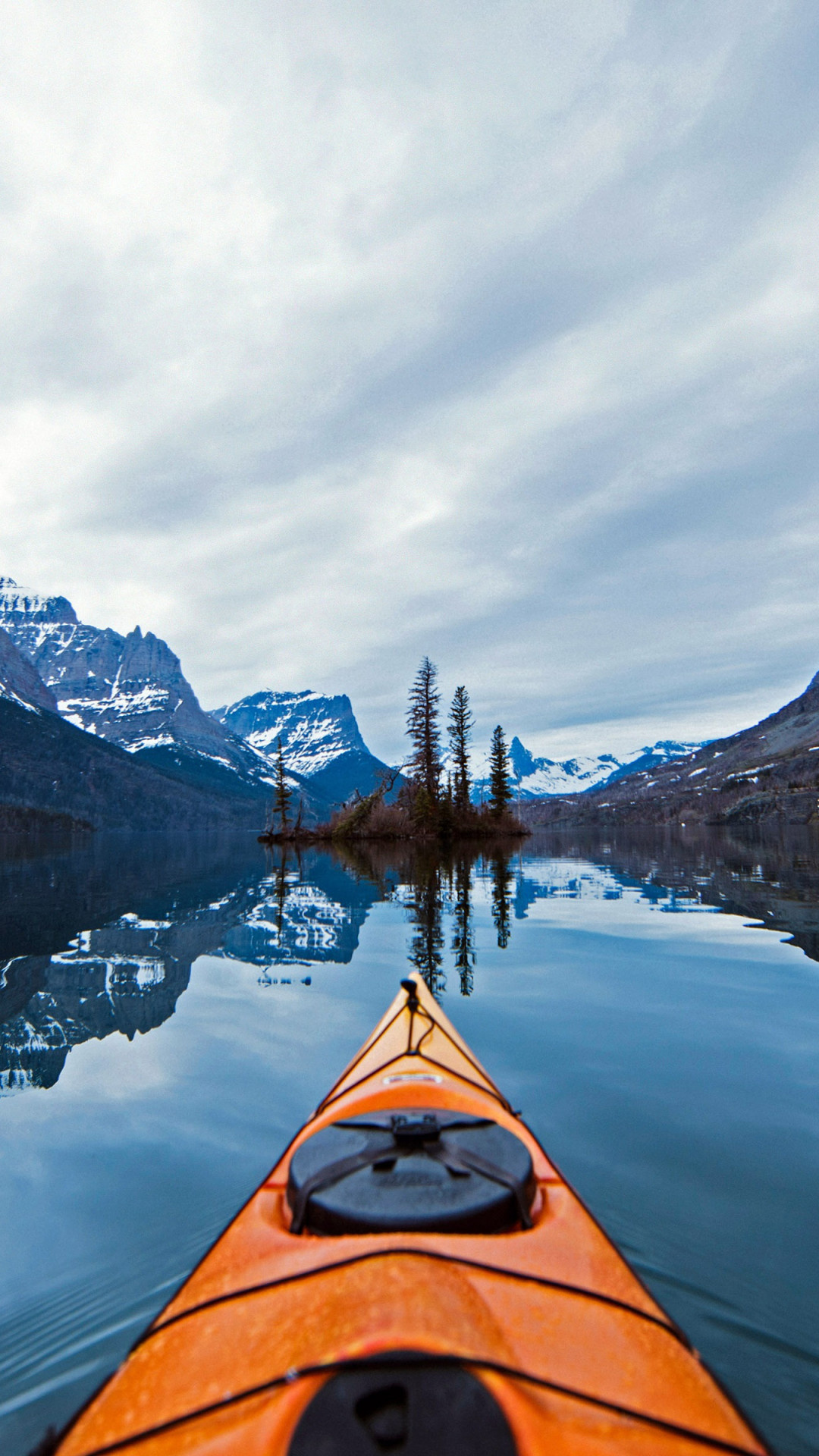Kayaking: Canoe camping over the amazing Glacier National Park water trail. 1080x1920 Full HD Background.