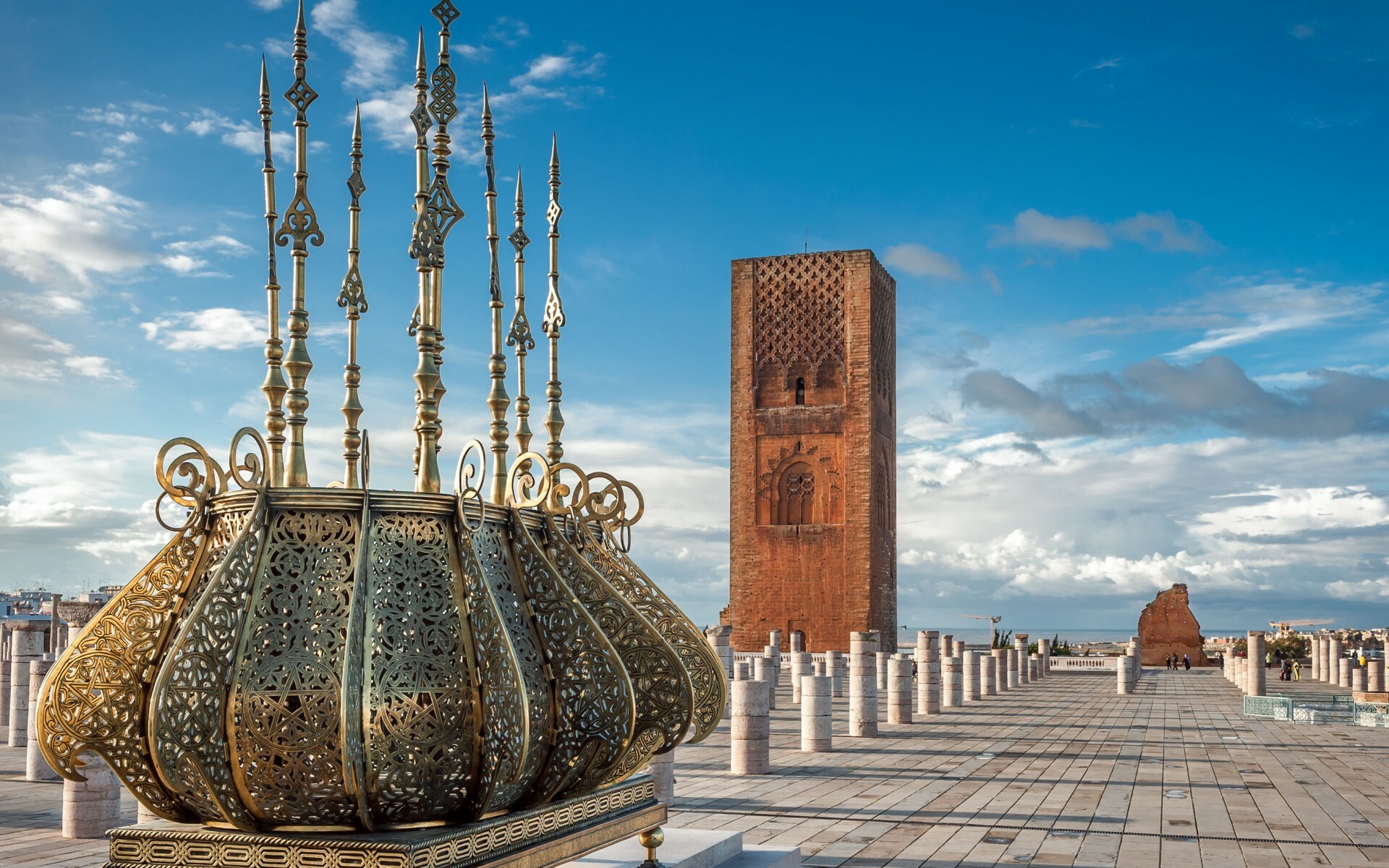Morocco: Hassan Tower, Arabs and Berbers make up majority of the population of the country. 1920x1200 HD Wallpaper.