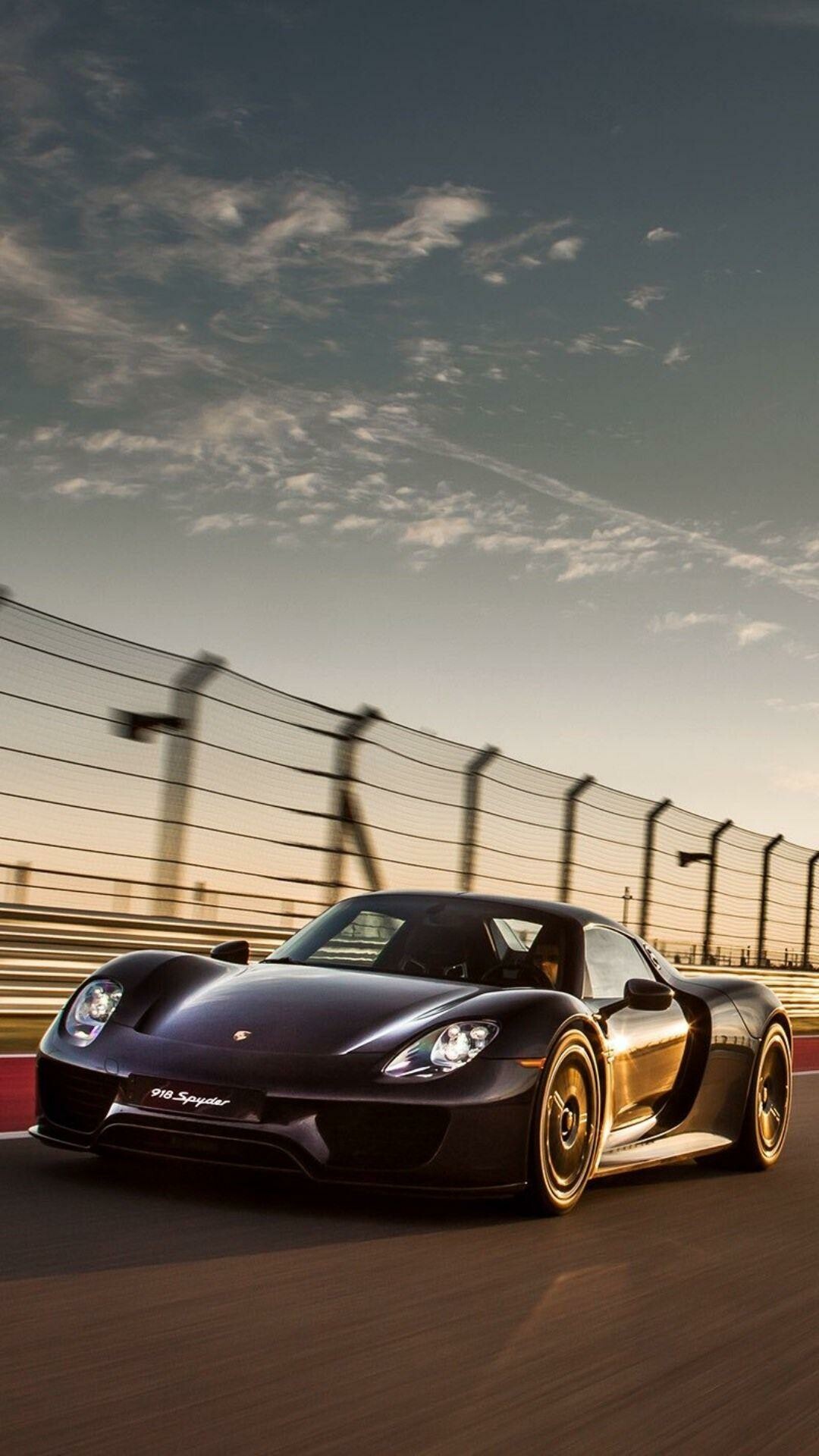 Porsche: The 918 Spyder is a limited-production mid-engine plug-in hybrid sports car manufactured by the German automobile manufacturer. 1080x1920 Full HD Background.