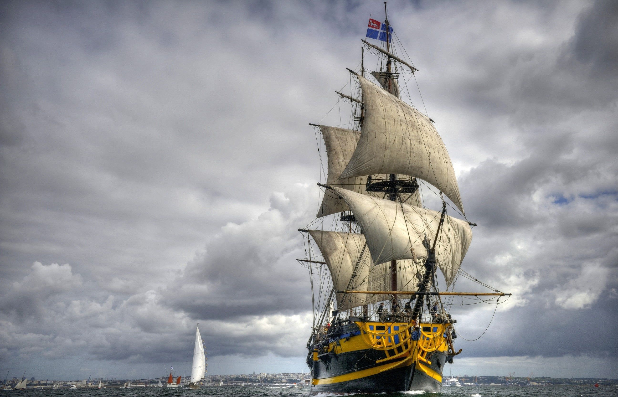 Windjammer: A sea-going vessel with sails mounted on masts, The power of wind propelling the vessel. 2600x1670 HD Background.