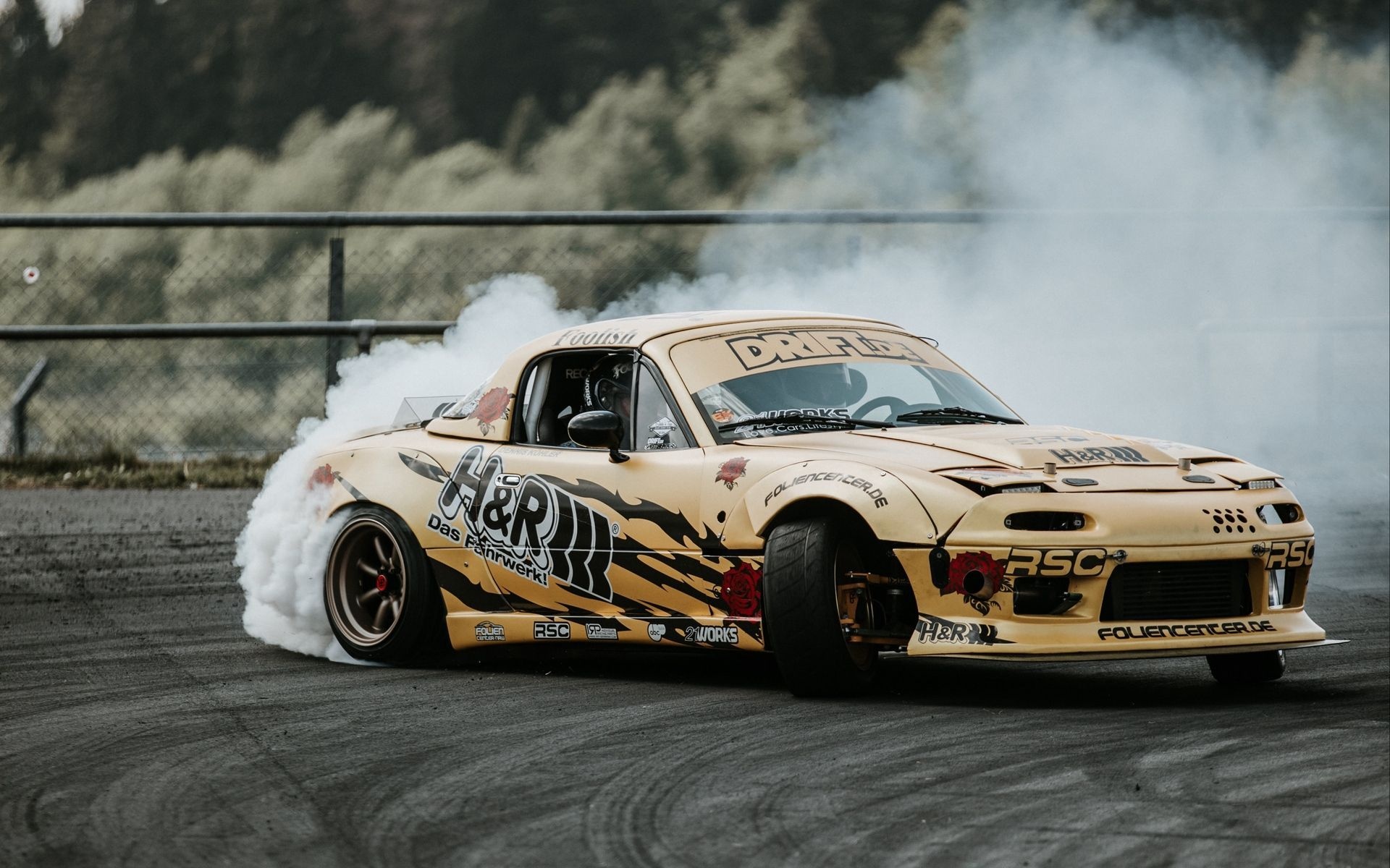 Drifting: Professional driving technique, Extreme motorsports discipline, Smoking tires. 1920x1200 HD Background.