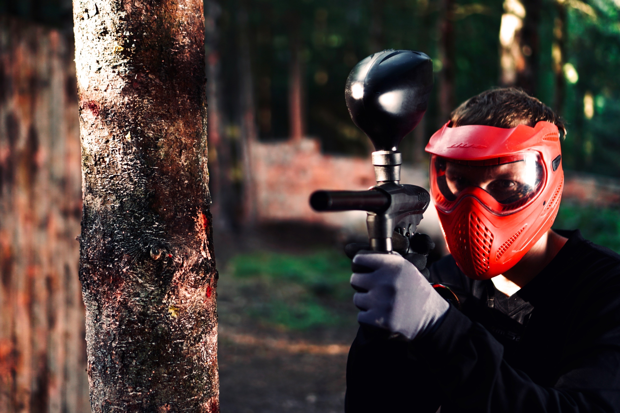 Paintball: A player during the game of a popular style known as "woodsball". 2480x1660 HD Wallpaper.
