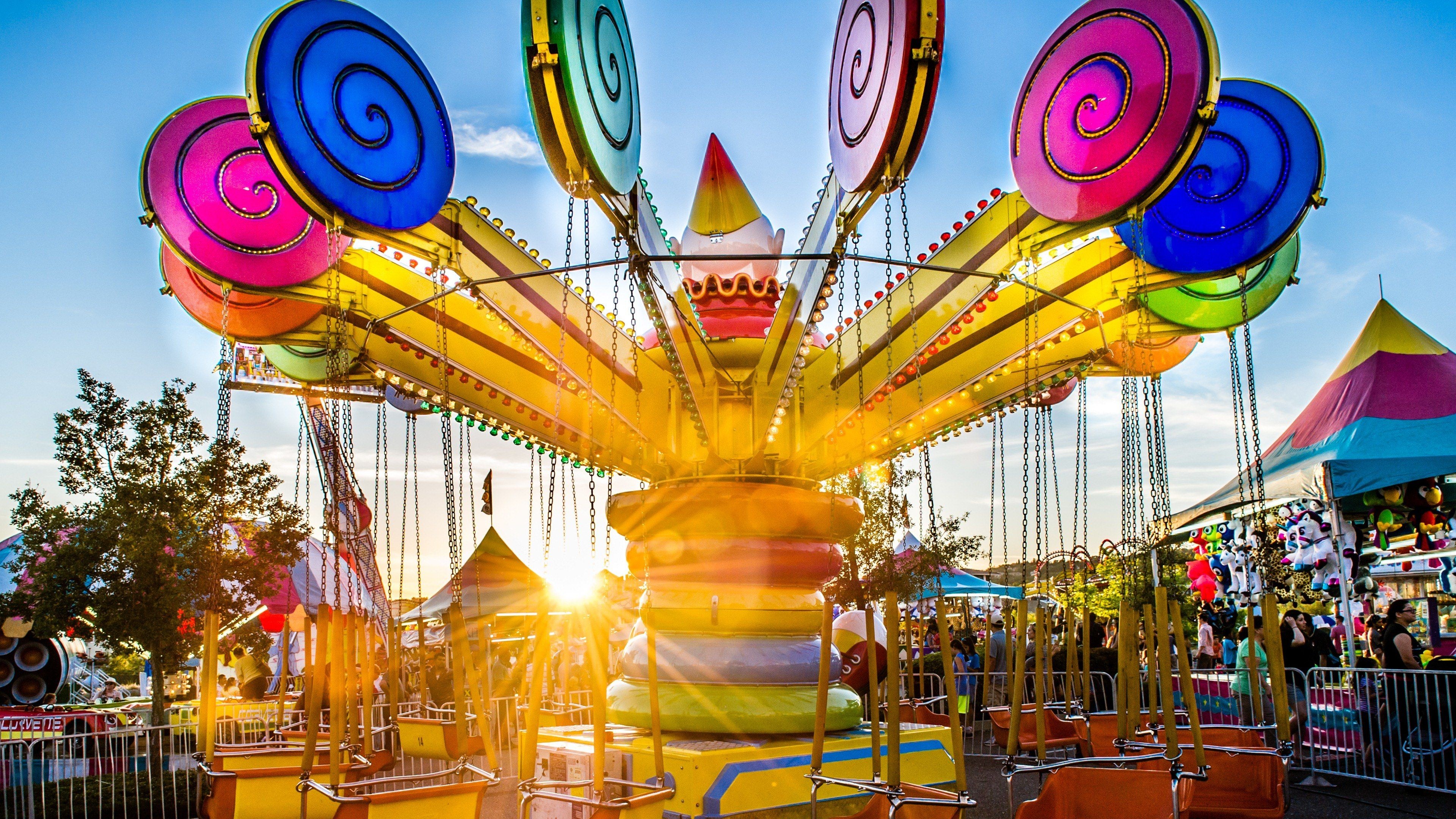 Fun Fair: Carnival made up of games of chance and skill, Swing ride. 3840x2160 4K Background.