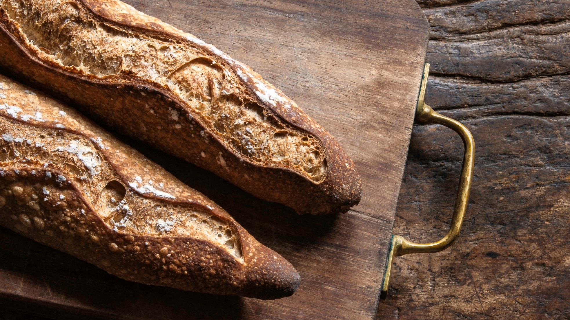 Baguette: Features a chewy crust with a moist, white crumb. 1970x1110 HD Background.