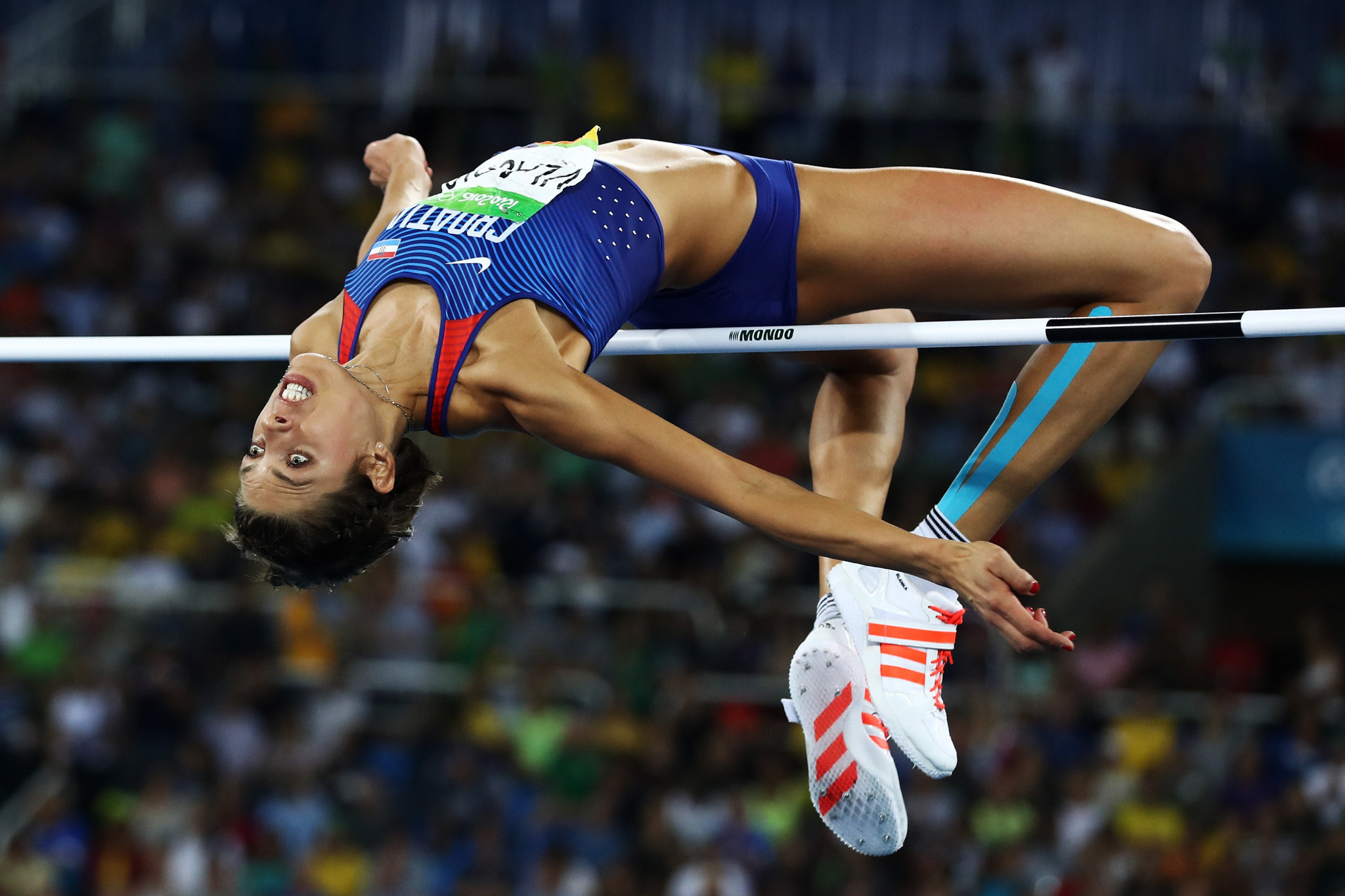 High Jump: Blanka Vlasic, Team Croatia, A jump for height over a horizontal bar in a track and field contest. 2050x1370 HD Background.
