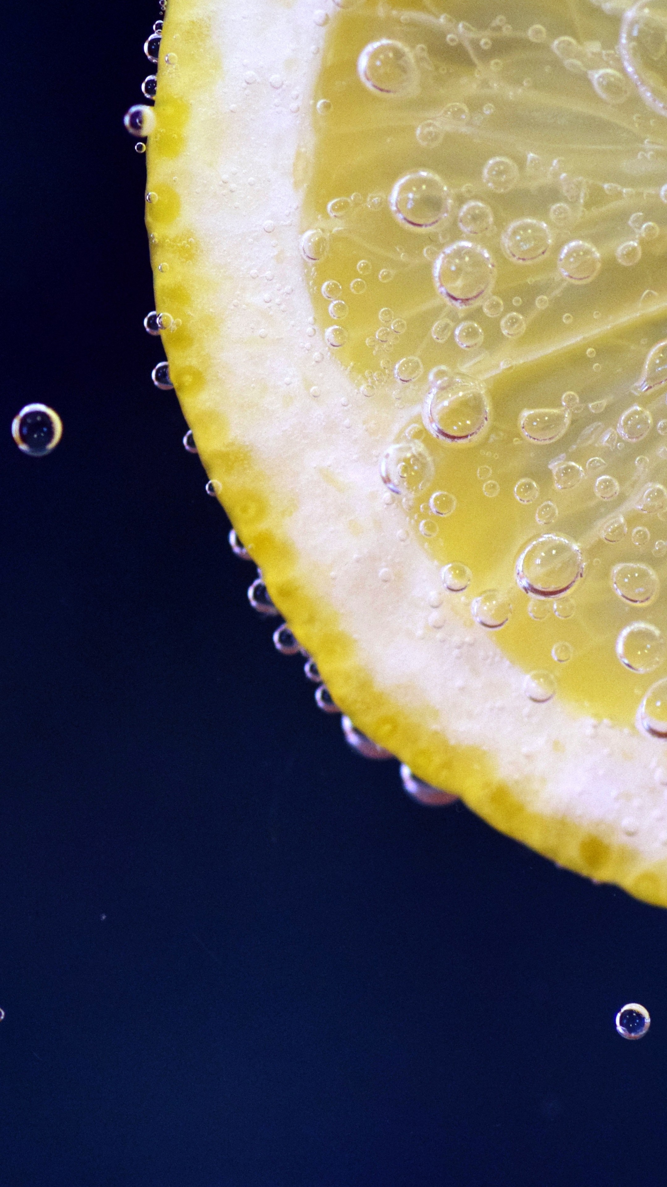 Lemon: Its juice is about 5% to 6% citric acid, with a pH of around 2.2. 2160x3840 4K Background.