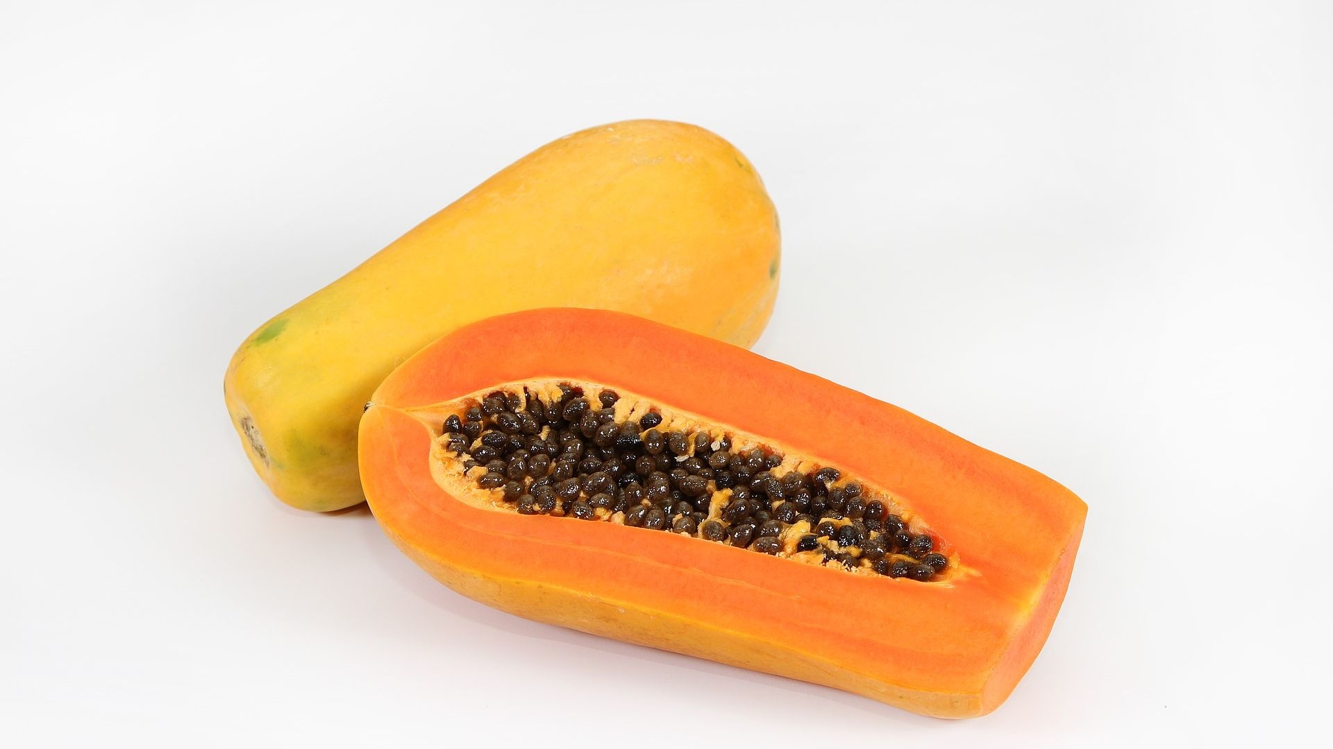 Papaya: Boasts a texture similar to mangos and a flavor akin to cantaloupes or peaches. 1920x1080 Full HD Wallpaper.