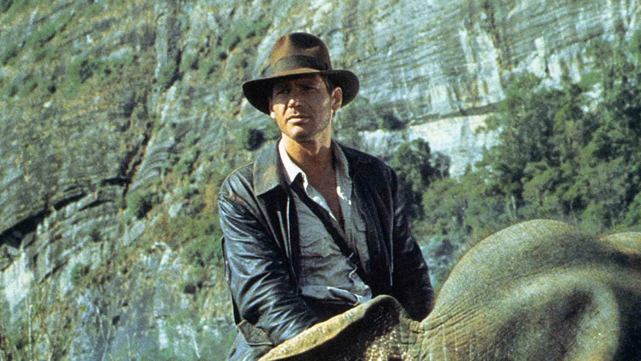 Harrison Ford (Indiana Jones): Worked with the most successful directors including Steven Spielberg, Ridley Scott, George Lucas. 2120x1190 HD Background.
