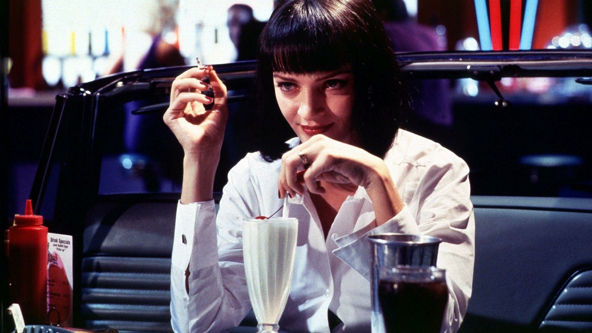 Pulp Fiction: Uma Thurman, Mia Wallace, the wife of the crime boss Marsellus Wallace. 1920x1080 Full HD Background.