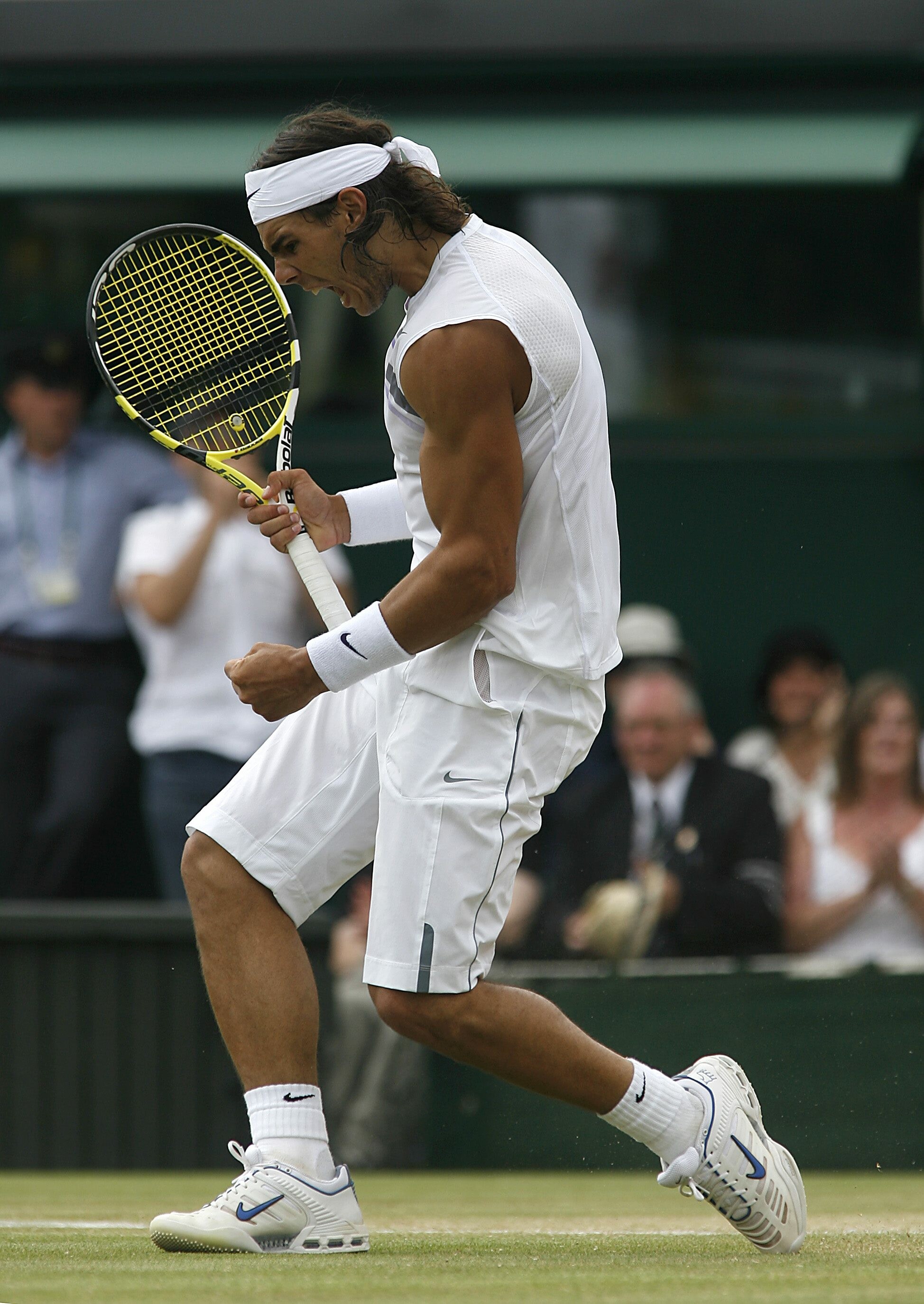 Rafael Nadal: He has won a record 14 French Open titles, Spanish tennis player. 1950x2750 HD Wallpaper.