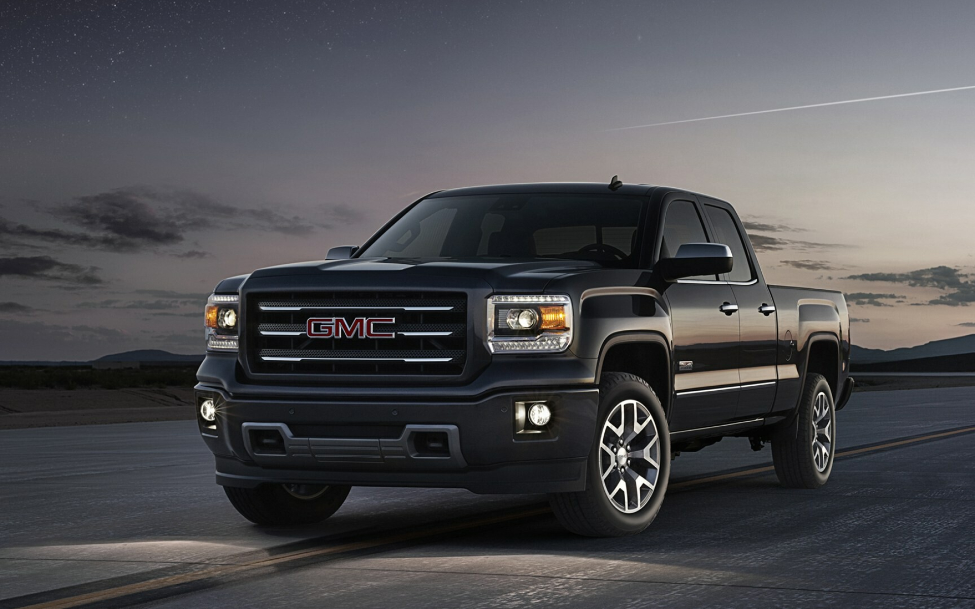 GMC Sierra: The large chrome grille, New generation of the popular American pickup. 1920x1200 HD Wallpaper.