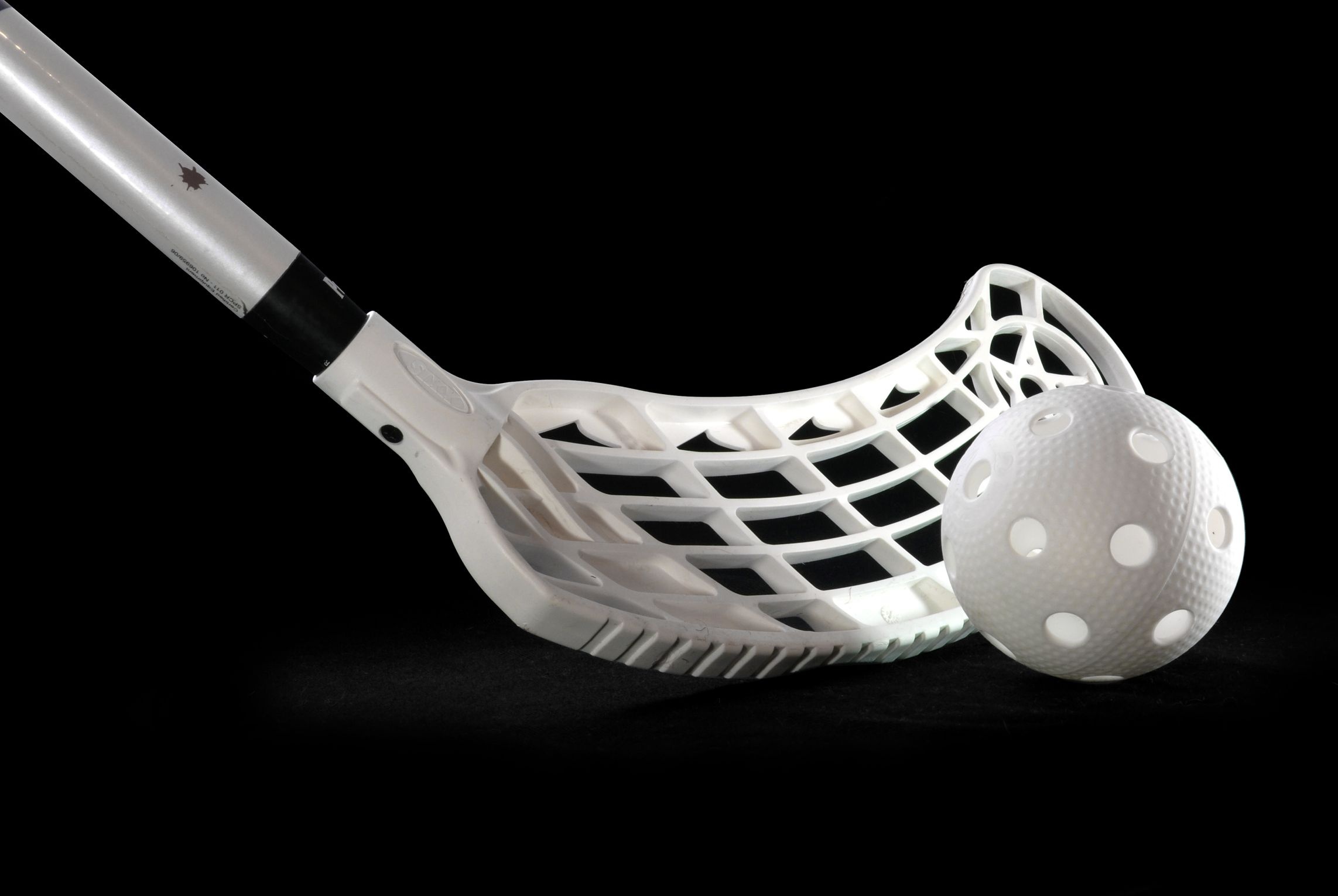 Floorball: A stick and a ball in the shade, Equipment for a modern indoor sports discipline. 2290x1530 HD Wallpaper.
