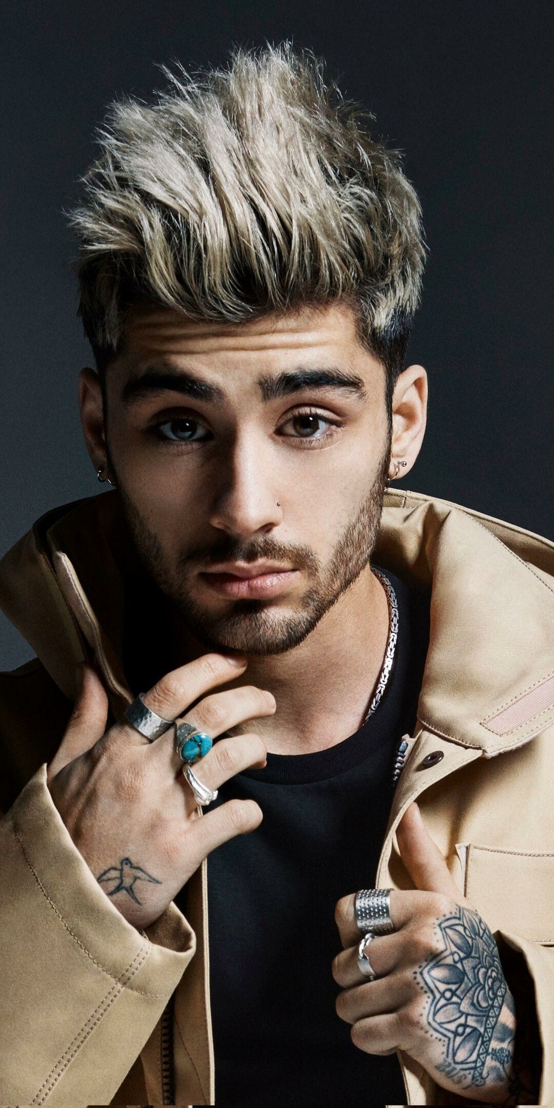 Zayn Malik: The first UK artist to debut at number one on the Hot 100 with a first charted single. 1080x2160 HD Background.