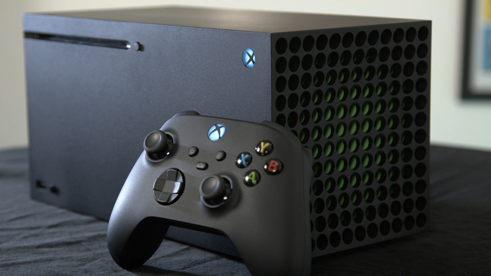 Xbox: Series X controller in a default color, Featuring a slightly smaller body and a “Share” button. 1920x1080 Full HD Wallpaper.