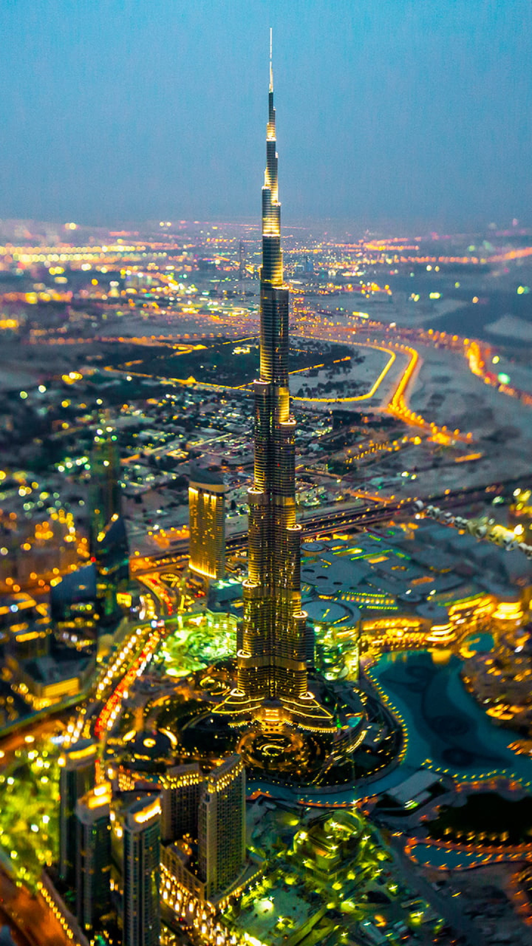 Burj Khalifa, Dubai cityscape, City lights at night, Captivating motion blur, 1080x1920 Full HD Phone