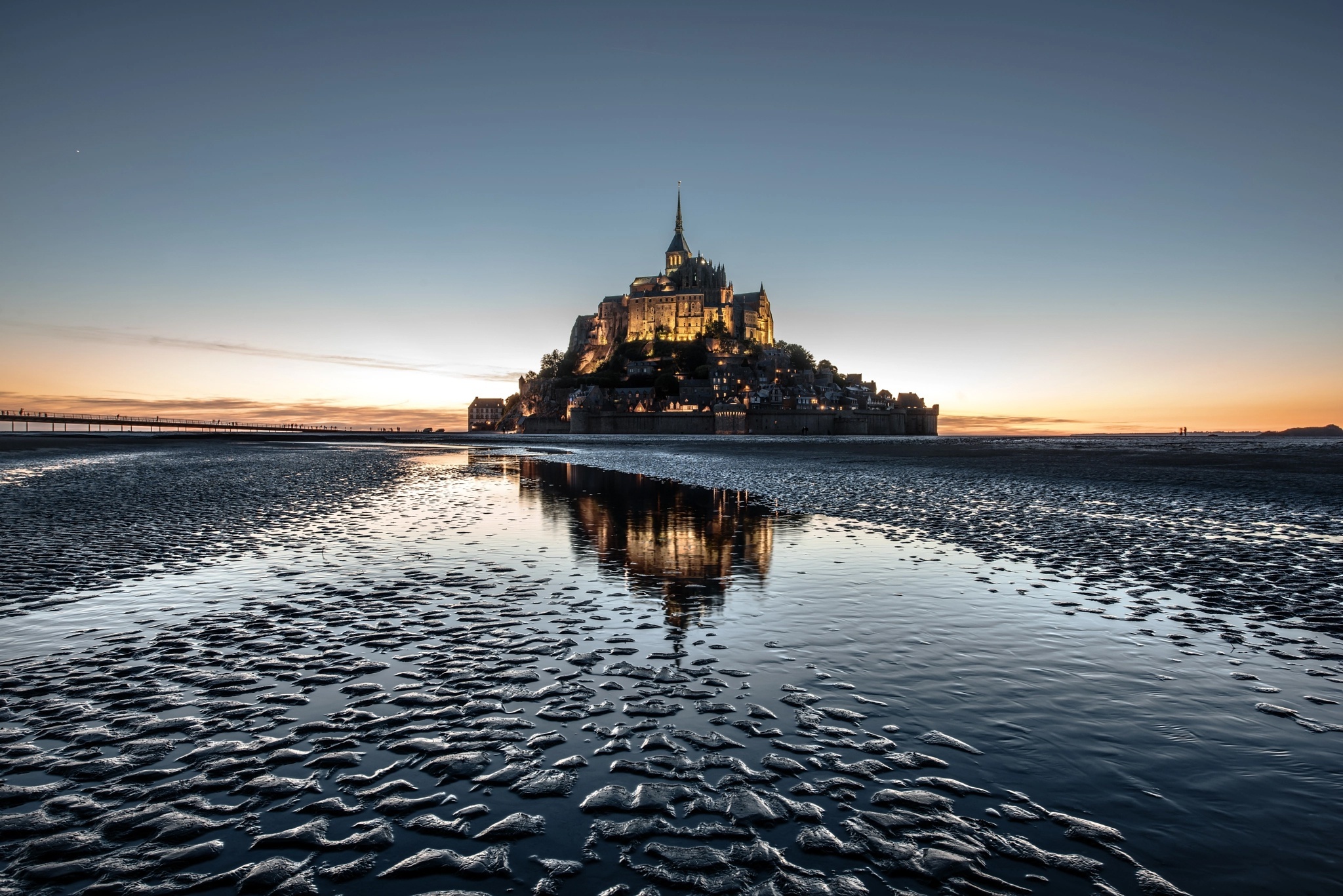 Mont St. Michel, France travel guide, Monastery reflection, Senior travelers, 2050x1370 HD Desktop