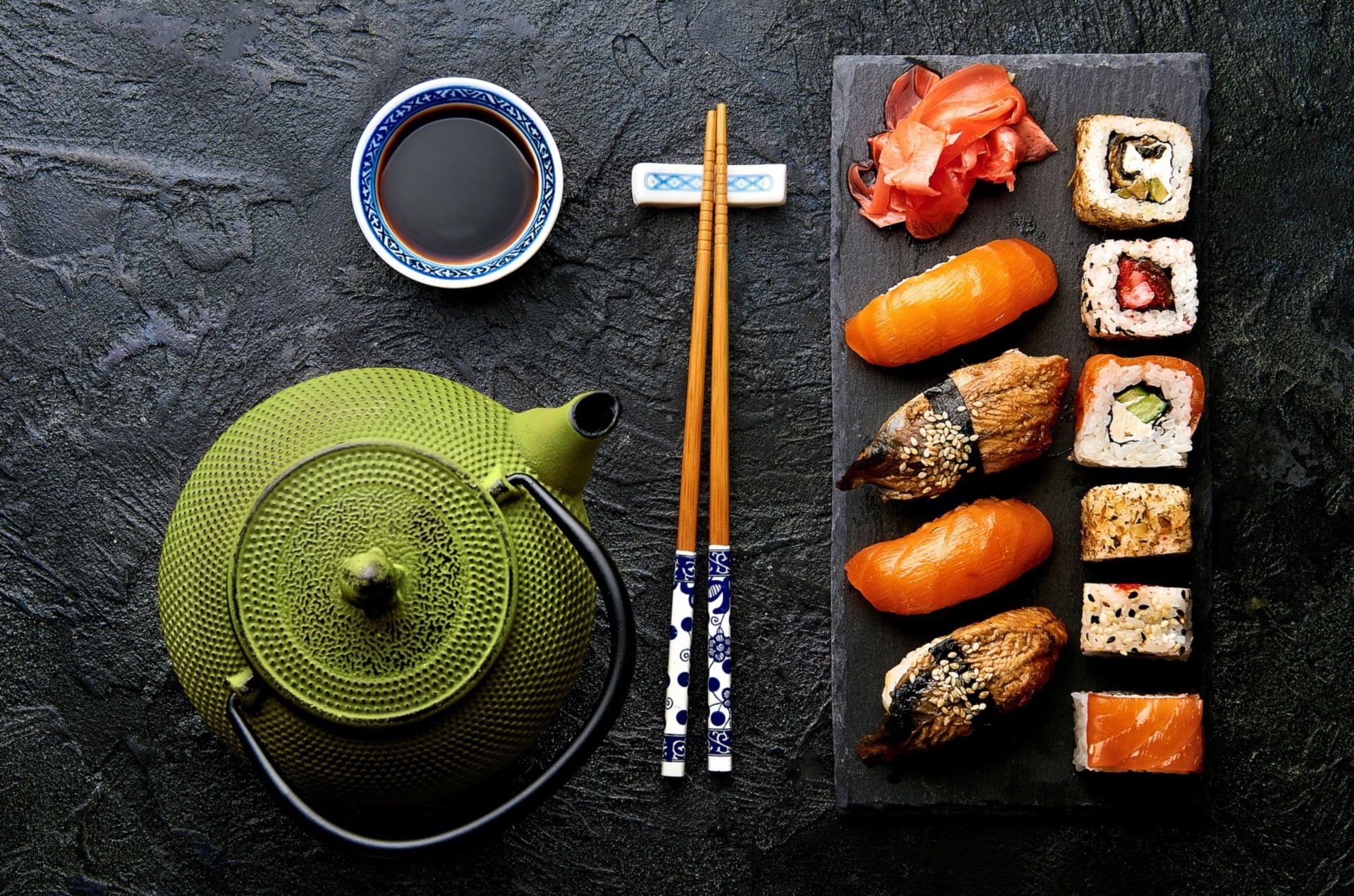 Sushi: Seafood placed on hand-pressed vinegared rice, Soy sauce. 1920x1280 HD Background.