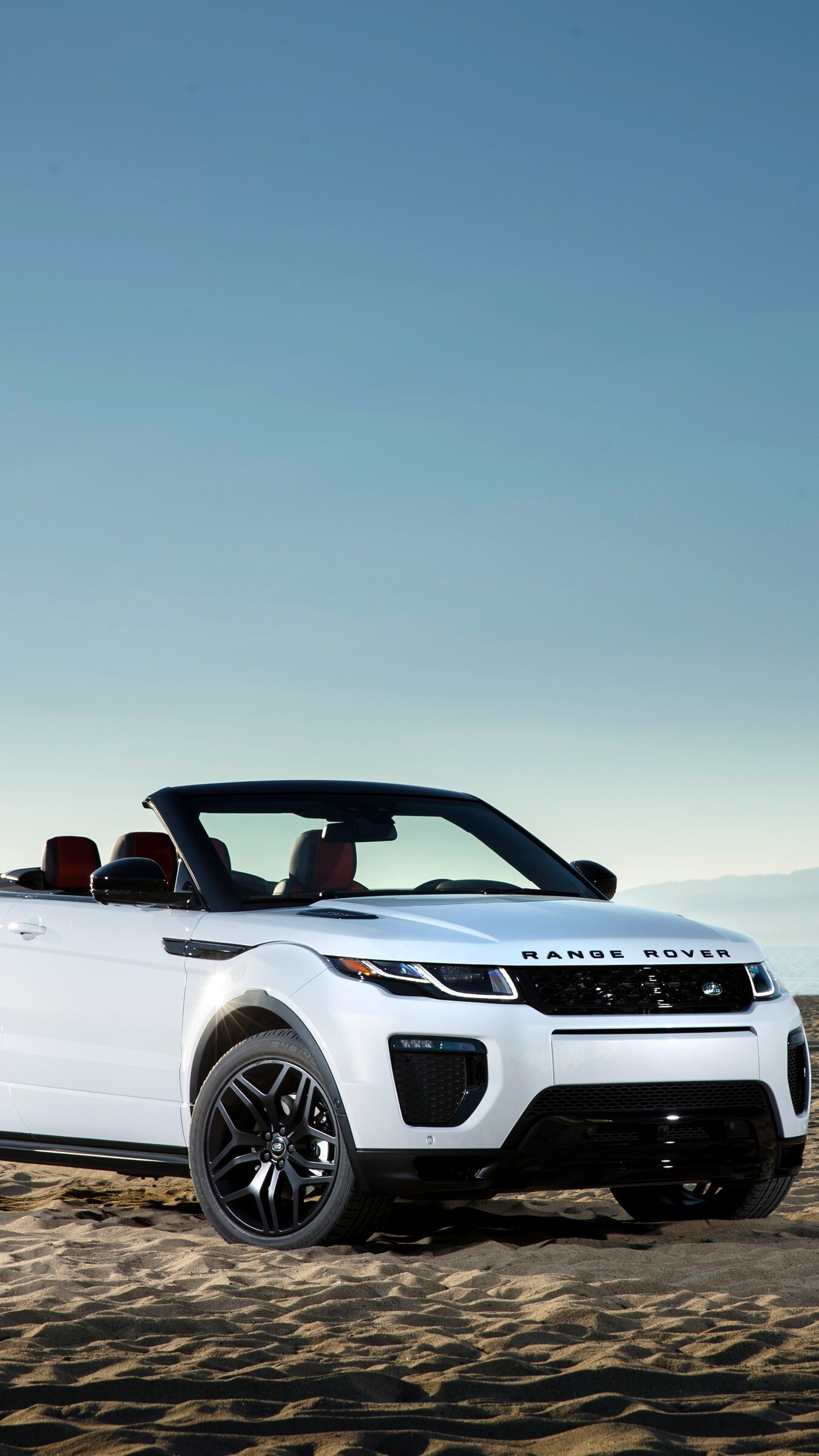 Range Rover: The first generation Evoque was produced from July 2011 until 2018. 1350x2400 HD Background.