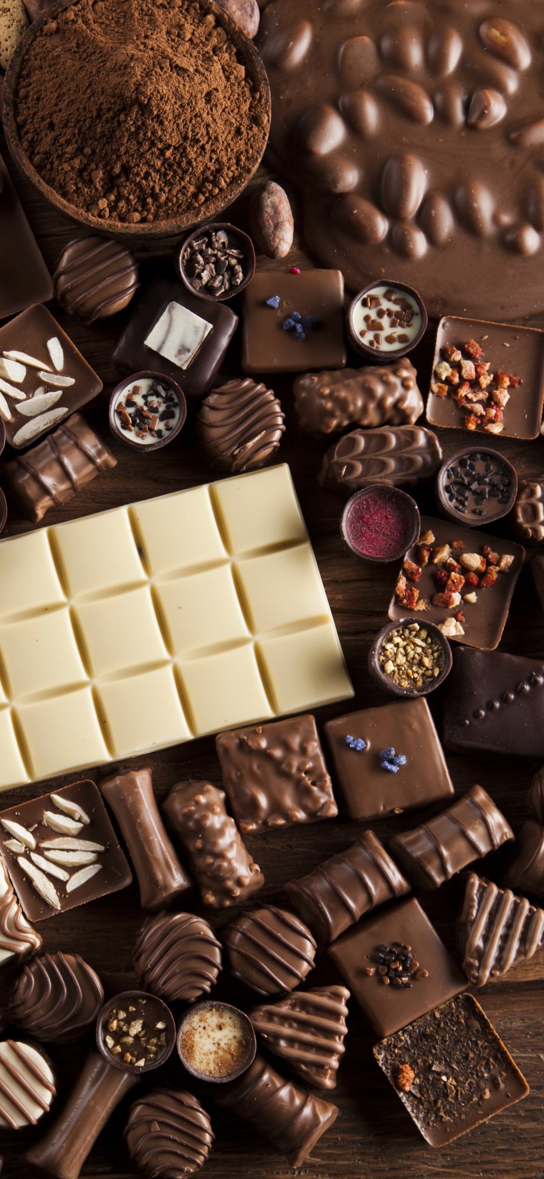 Chocolate: Contains small amounts of theobromine, a compound similar to caffeine, Confectionery. 1080x2340 HD Background.