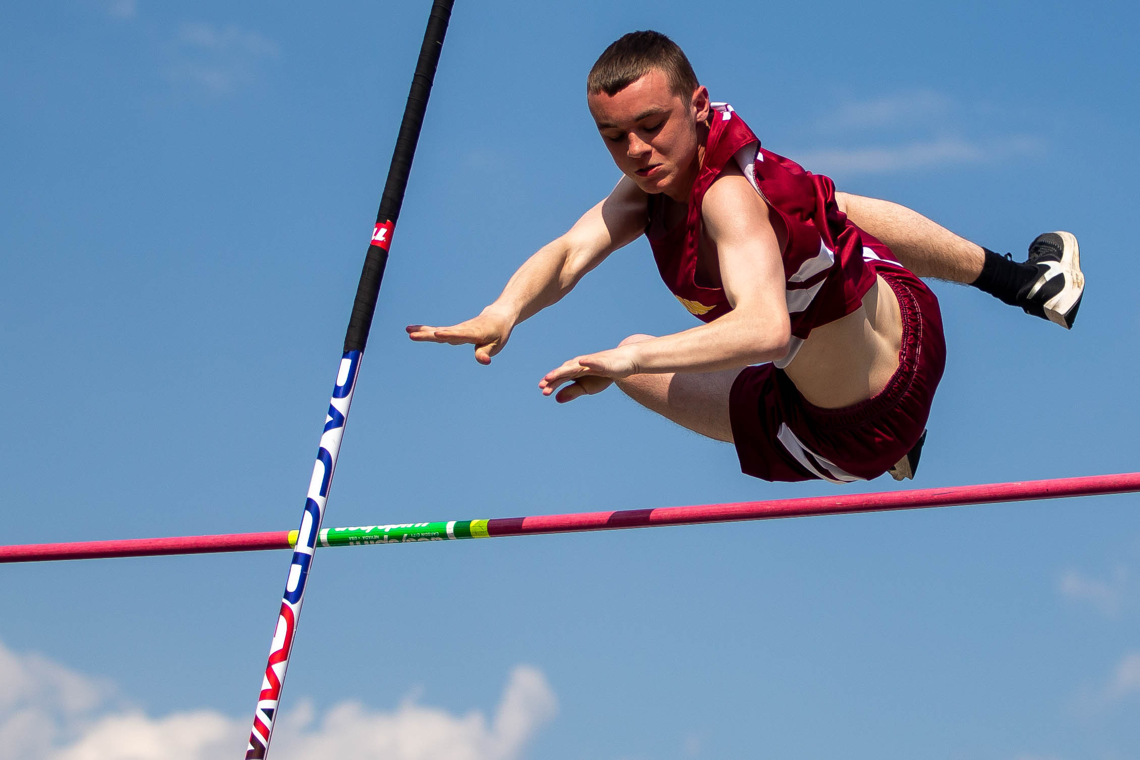 Pole Vaulting: Blind Michigan high school pole vaulter, Trust in coaches, An athletics contest. 2260x1510 HD Background.
