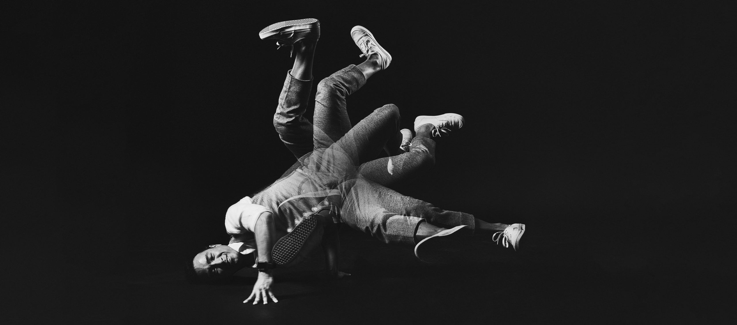 Breakdancing: David Yi, Corporate lawyer and an accomplished breakdancer. 2560x1130 Dual Screen Wallpaper.