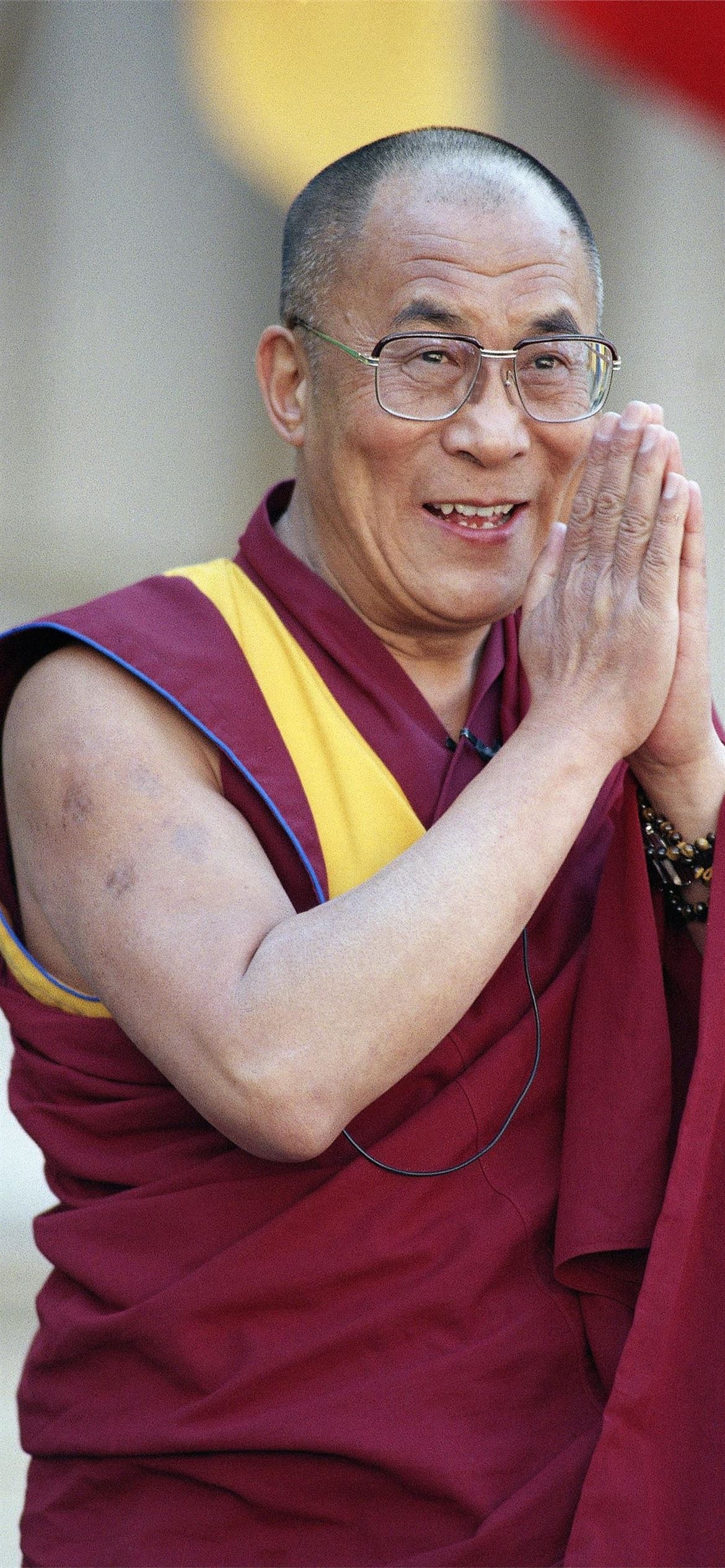 Dalai Lama: Known in Tibetan as the Rgyal-ba Rin-po-che or simply as the Rgyal-ba. 1170x2540 HD Background.