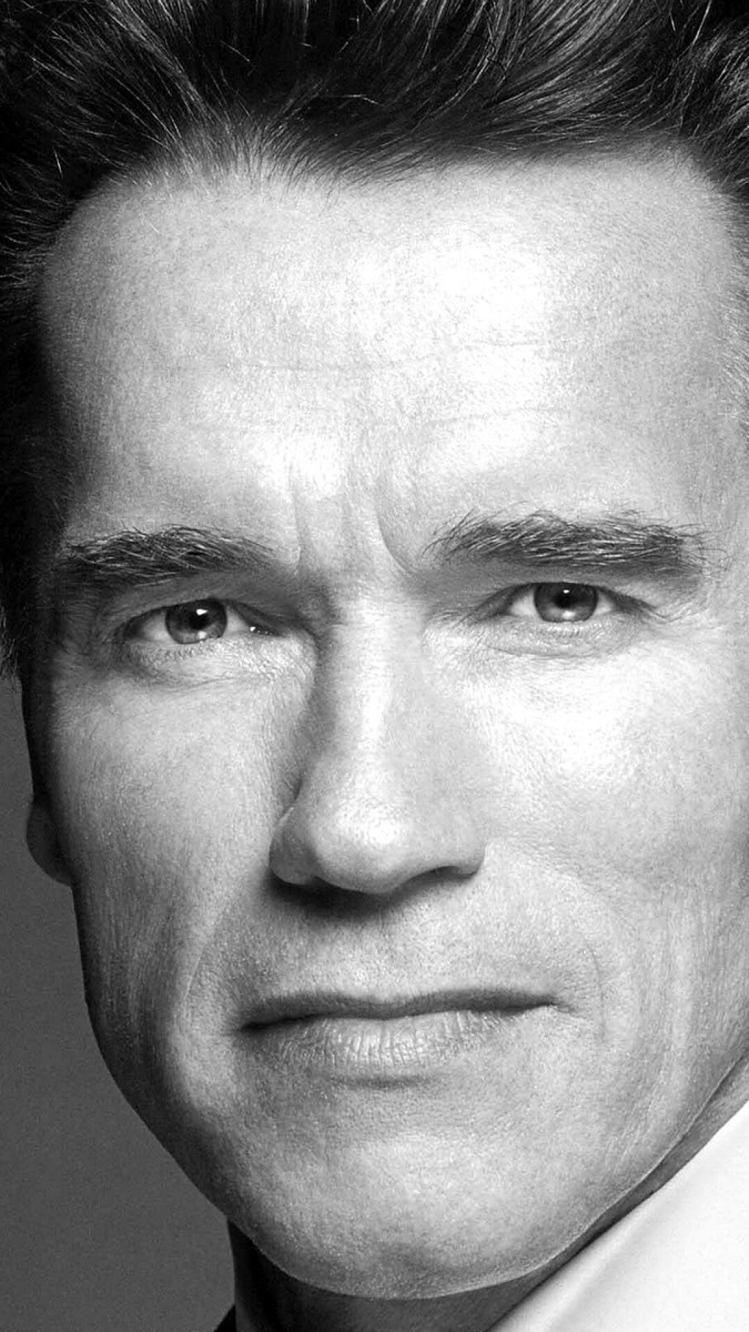 Arnold Schwarzenegger: Took part of Dr. Alexander "Alex" Hesse in a 1994 American comedy film, Junior. 1080x1920 Full HD Wallpaper.